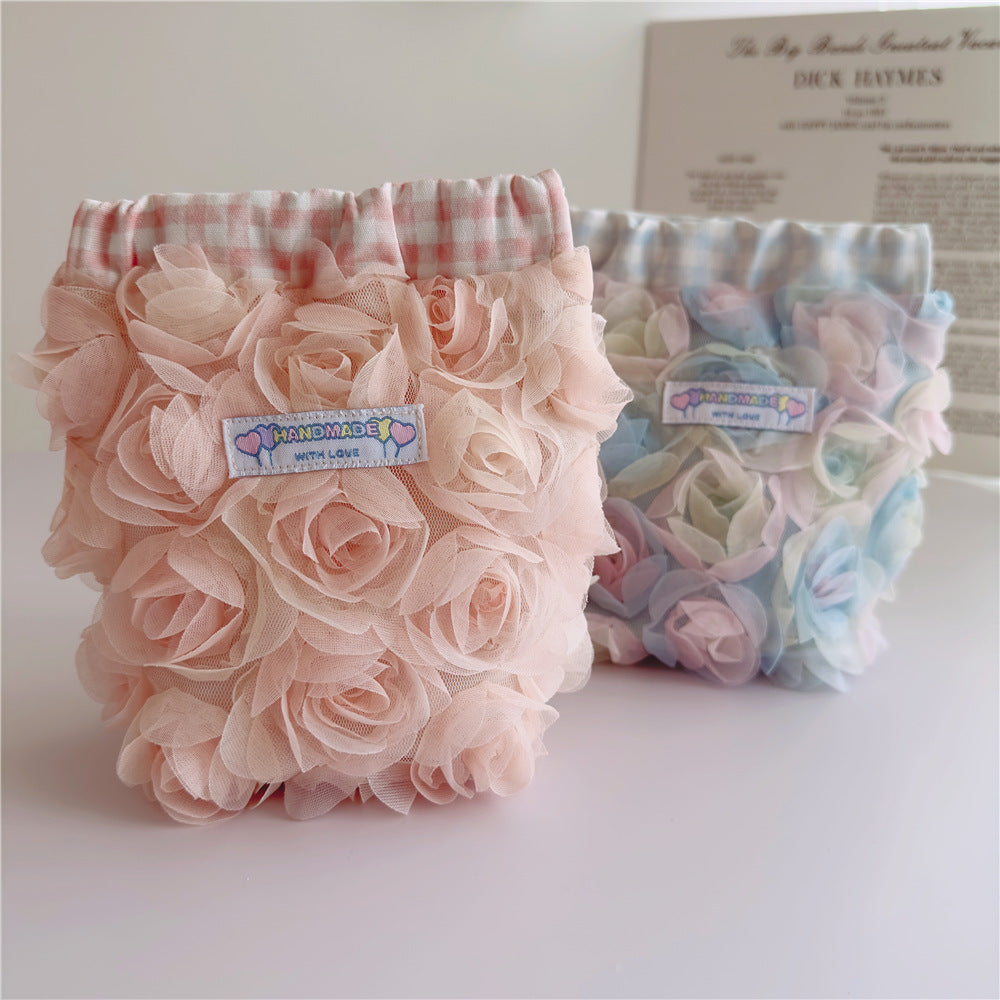 Rose Cosmetic Bag within blue