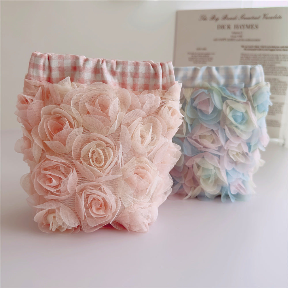 Rose Cosmetic Bag within blue