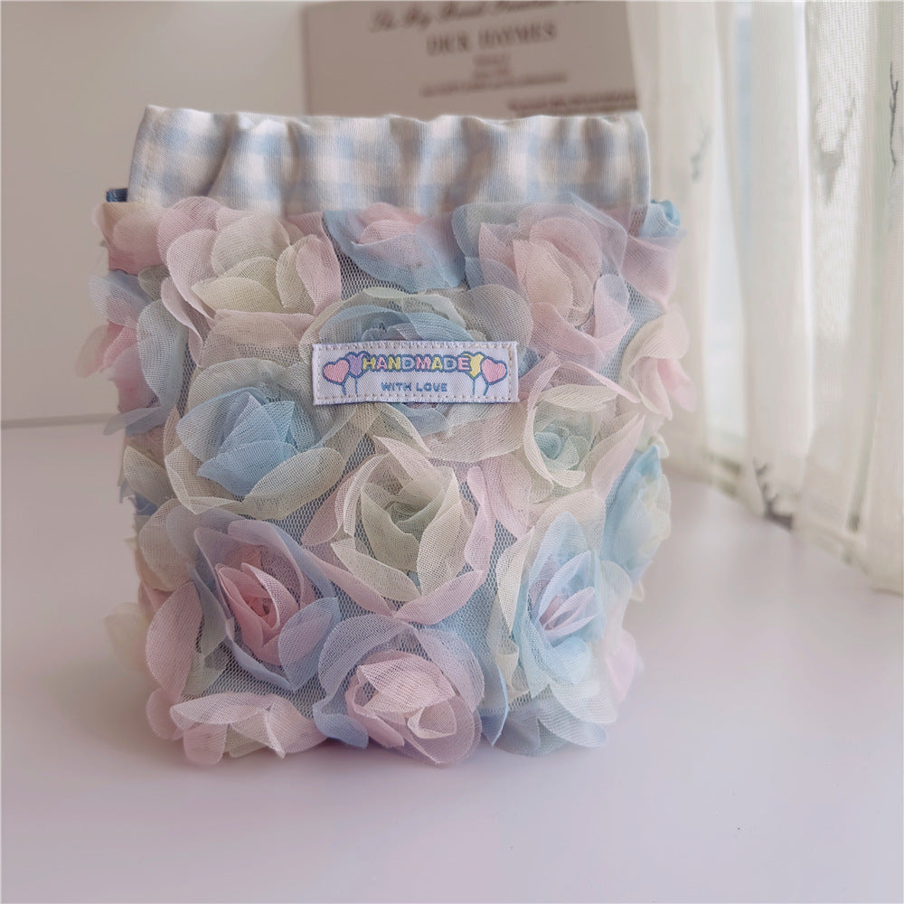Rose Cosmetic Bag within blue