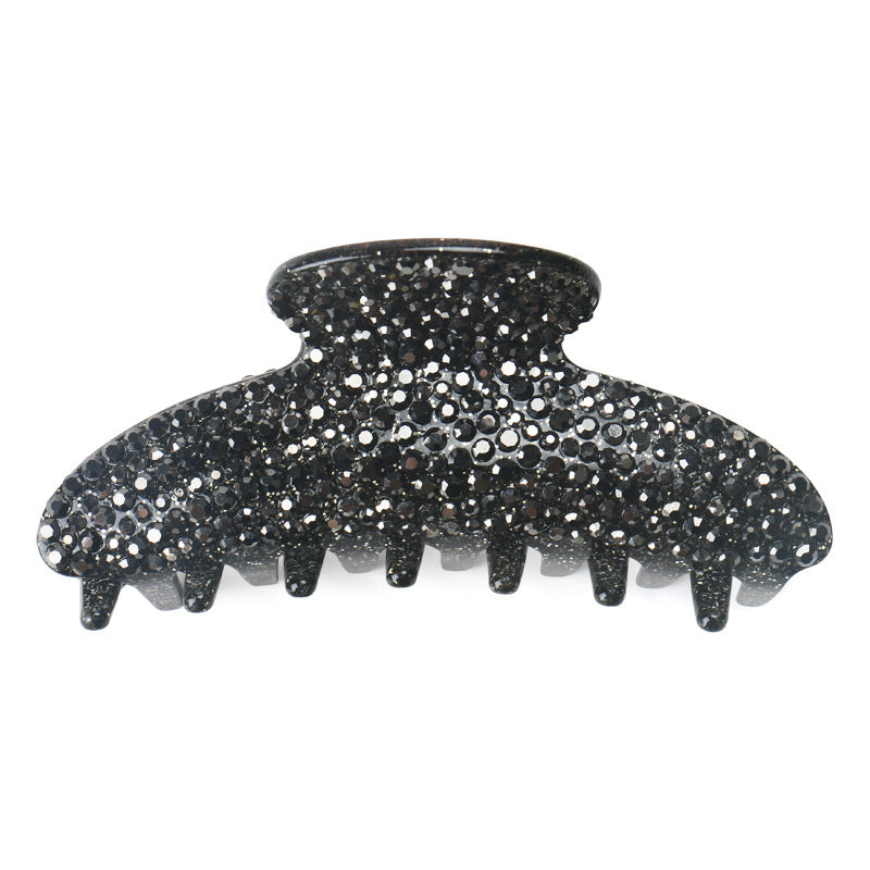 Handmade rhinestone claw within Blue