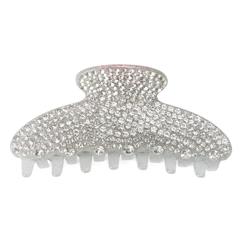 Handmade rhinestone claw within Blue