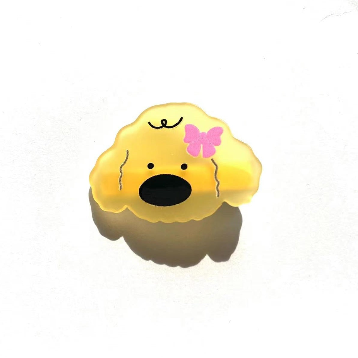 Bow tie dog within yellow clip