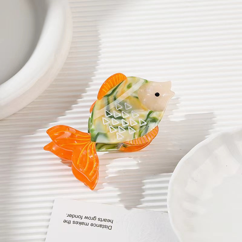 Goldfish Claw Within Orange