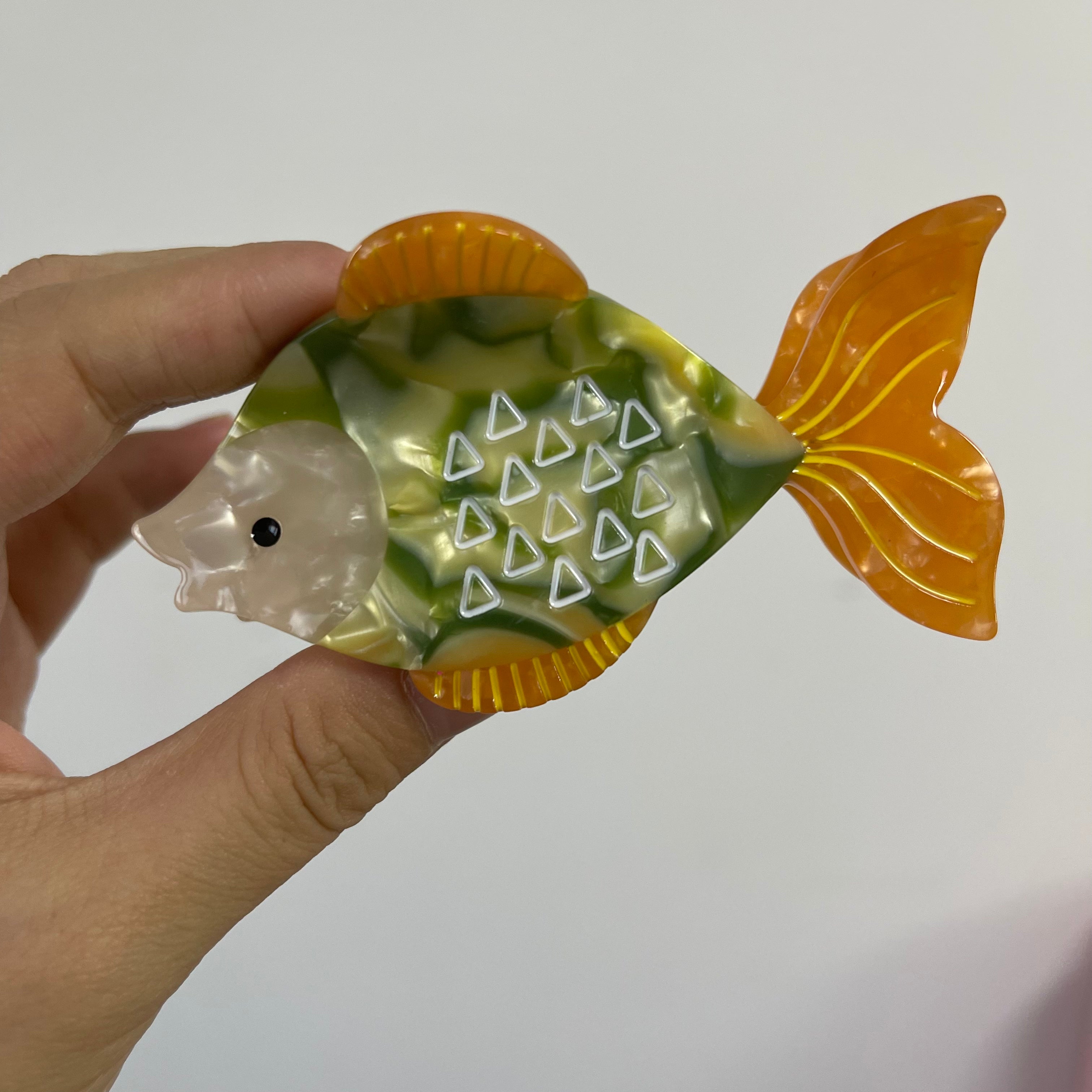 Goldfish Claw Within Orange