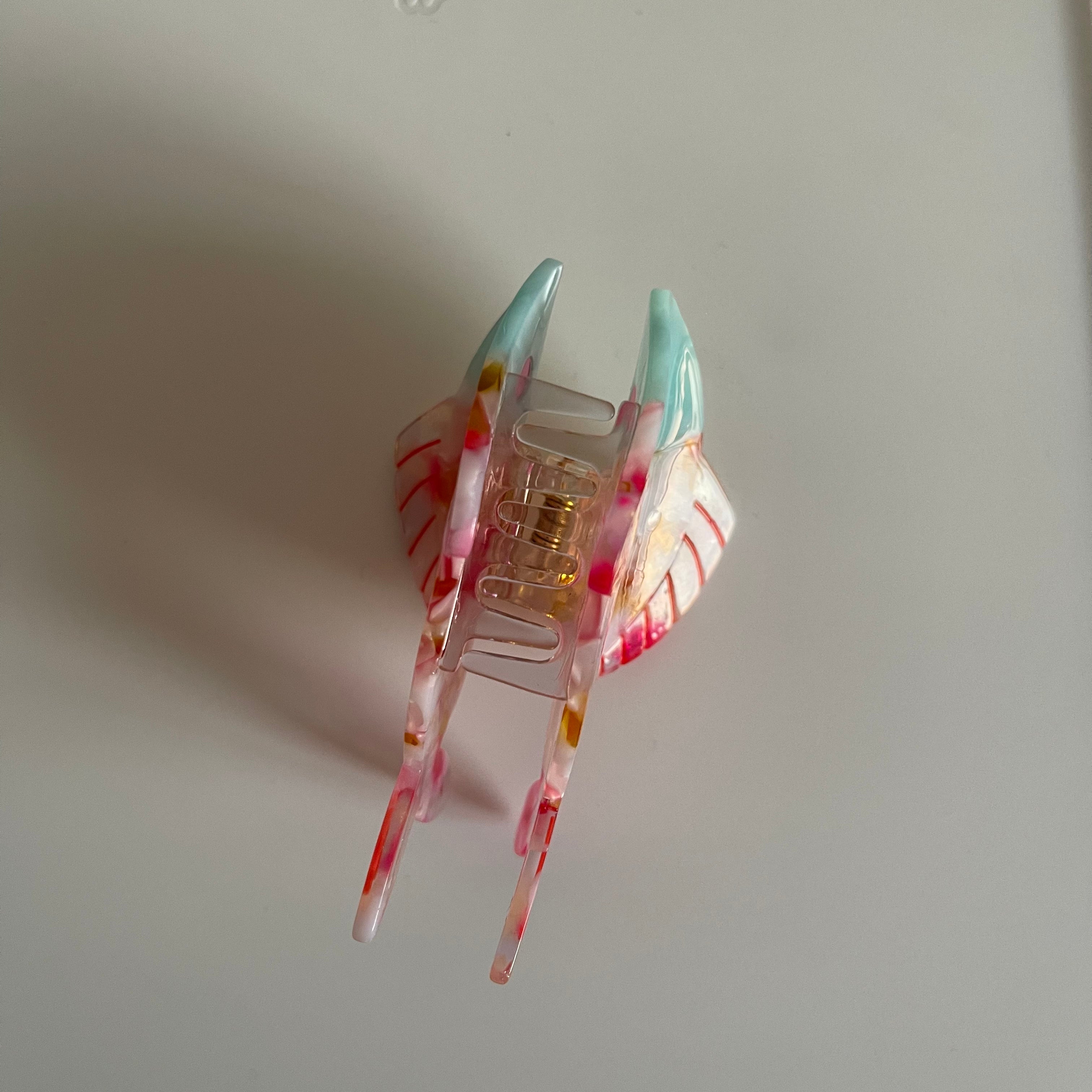 Goldfish Claw Within Pink