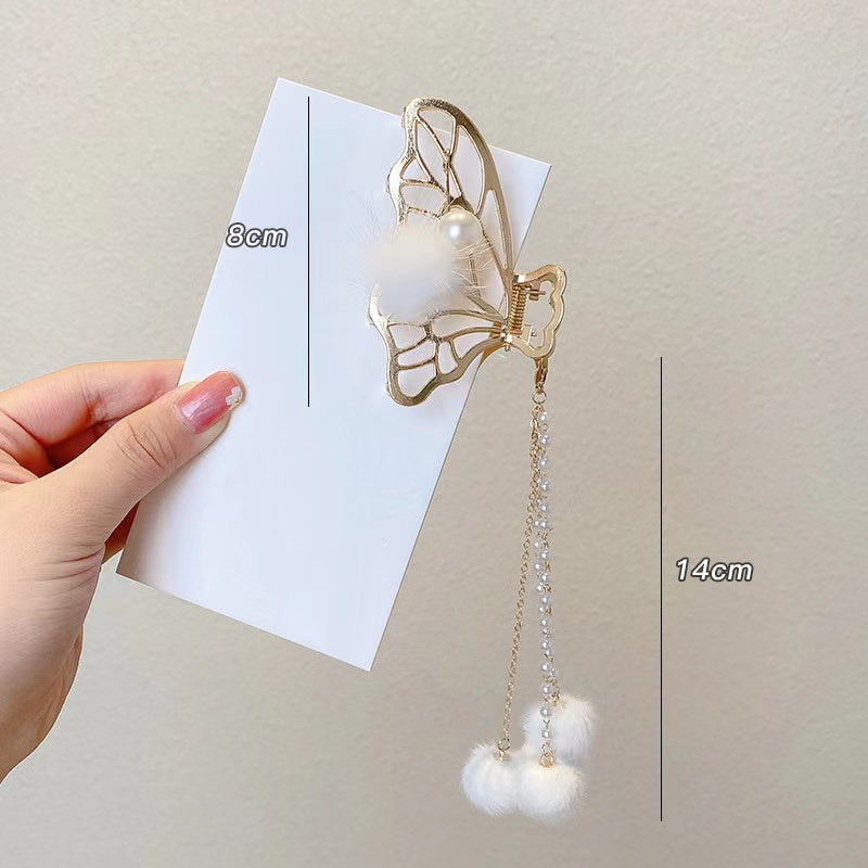 Butterfly tassels claw