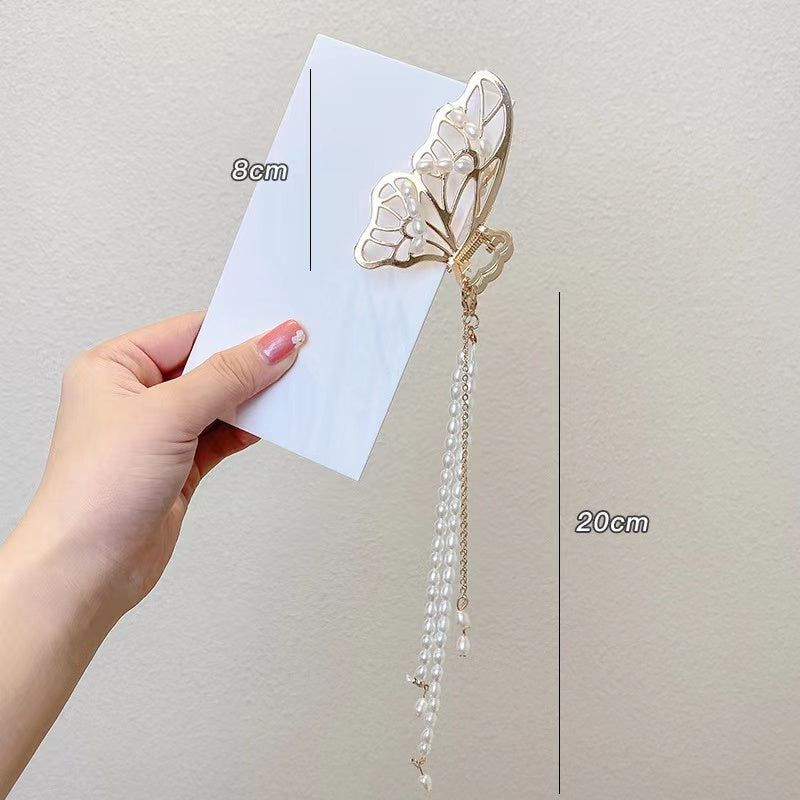 Butterfly tassels claw