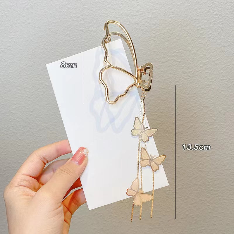 Butterfly tassels claw