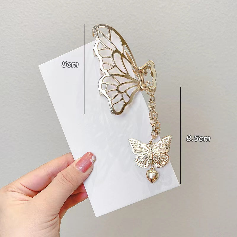 Butterfly tassels claw