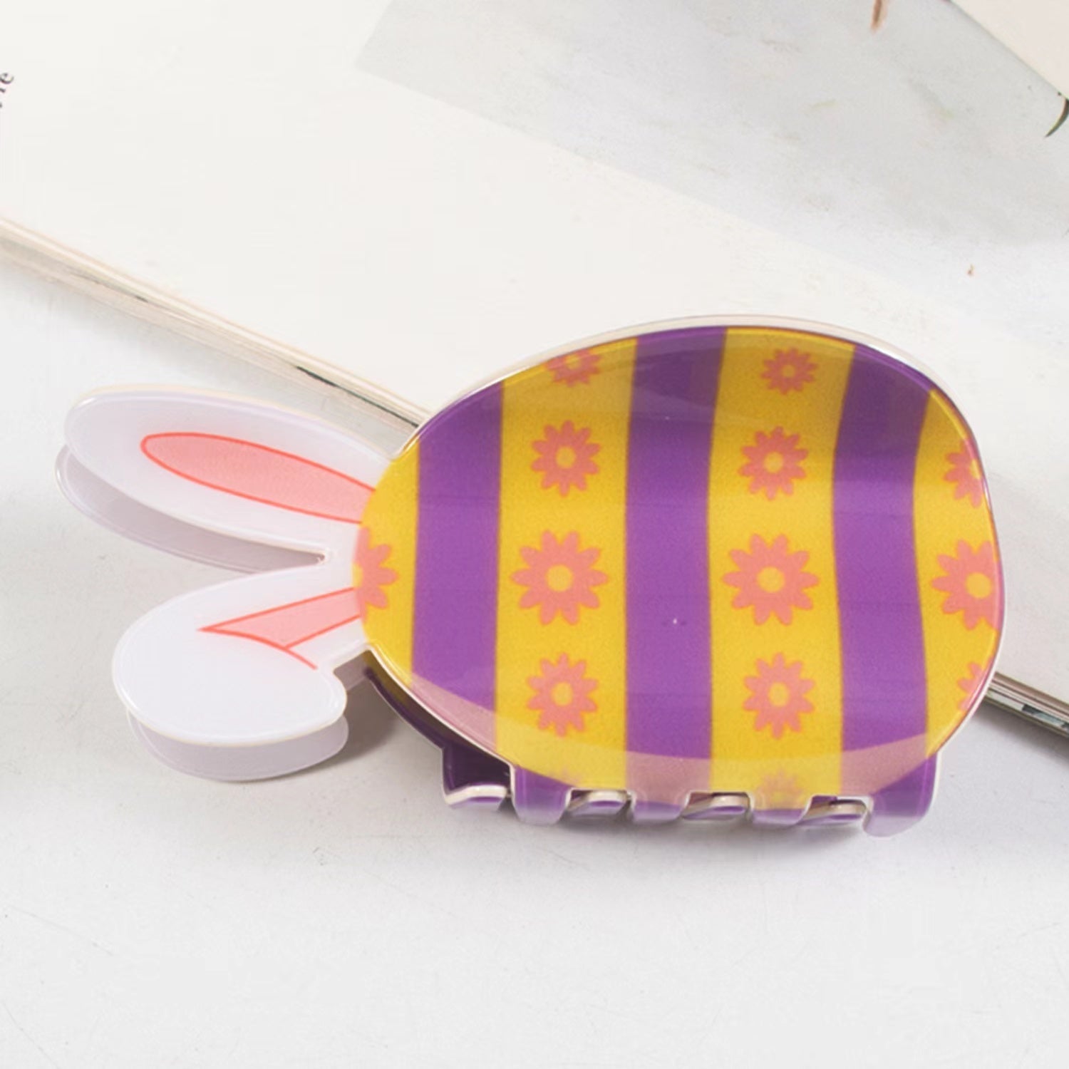 Easter egg claw within purple
