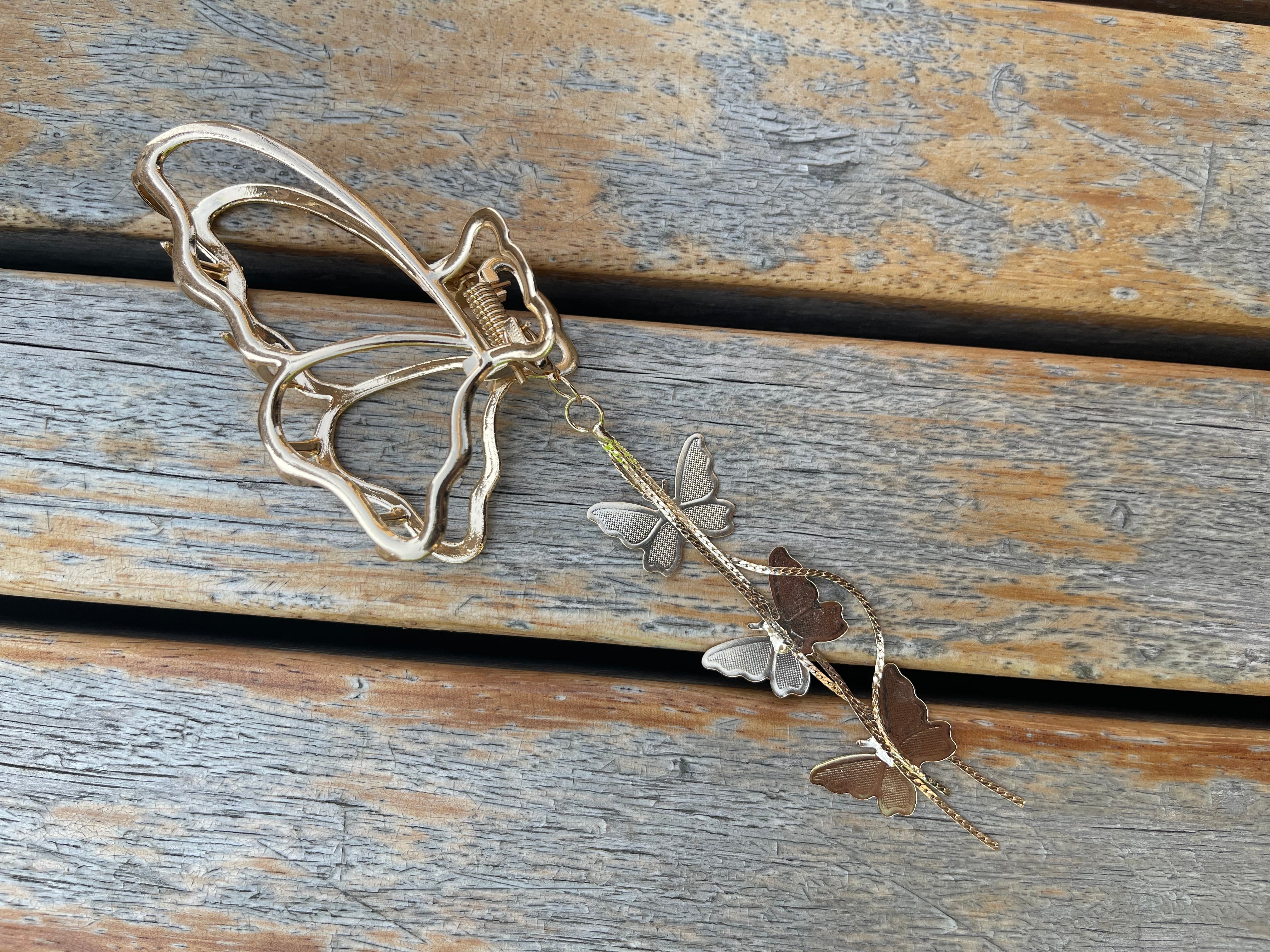 Butterfly tassels claw