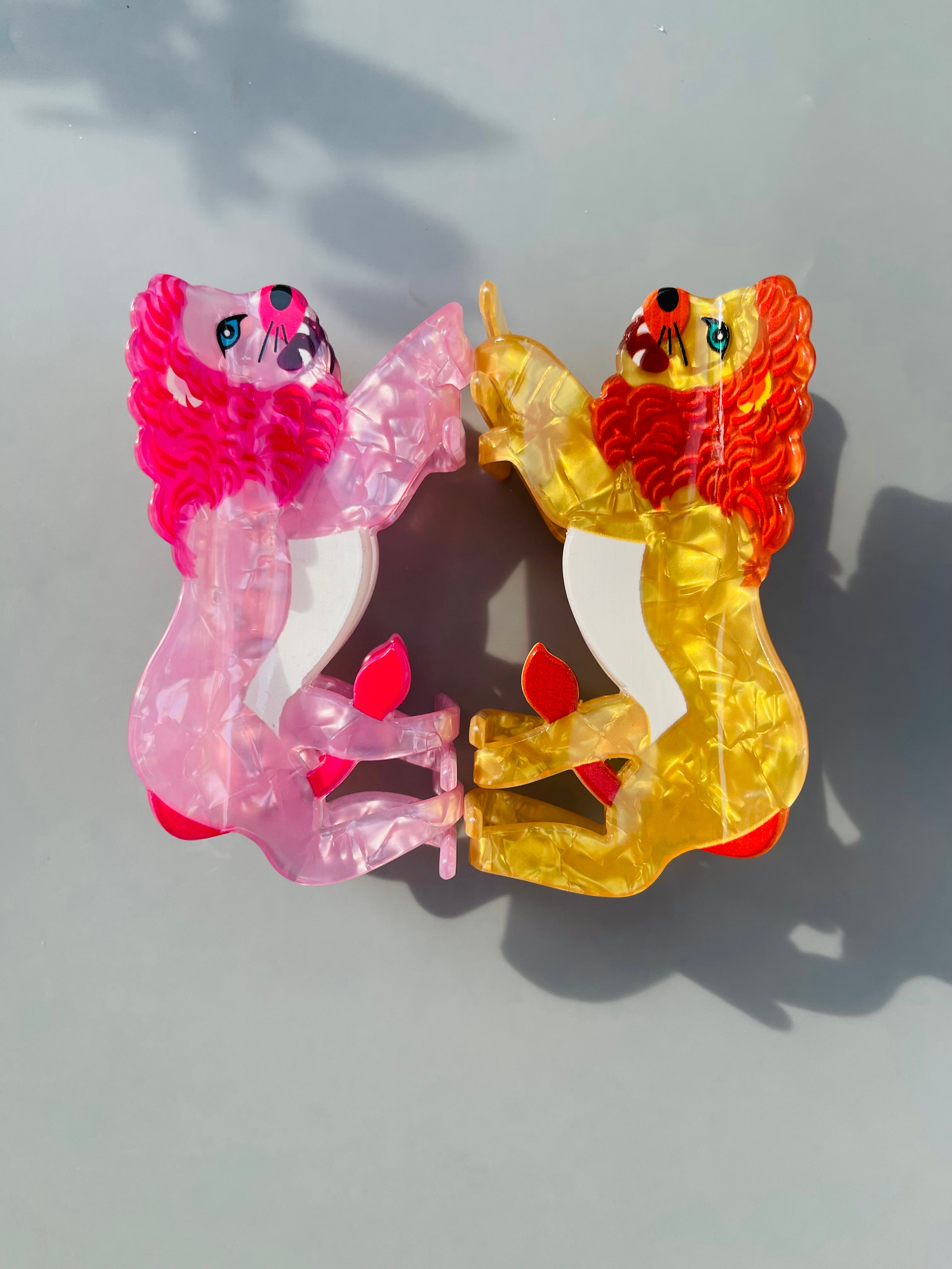 Hungry lion claw within pink