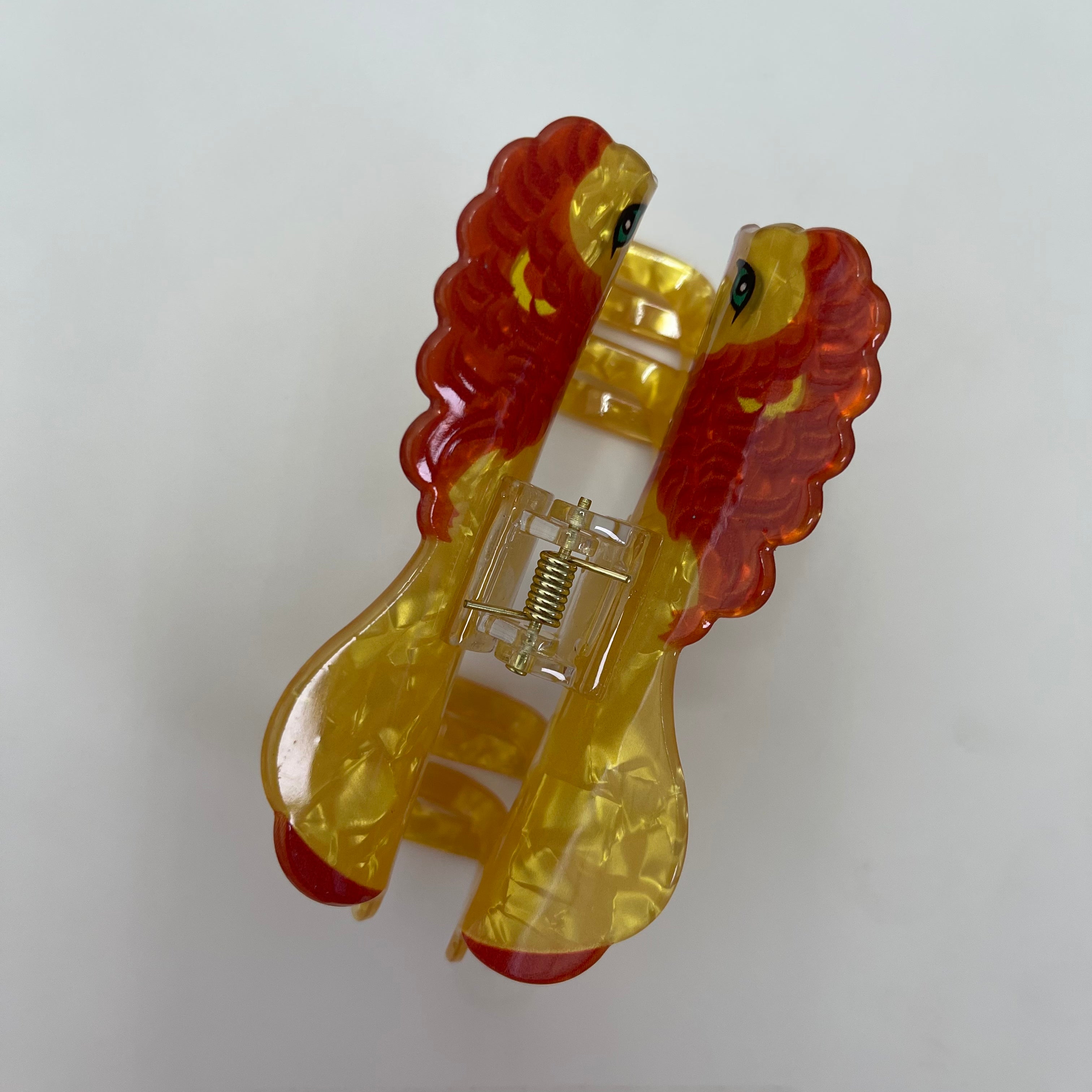 Hungry lion claw within Yellow