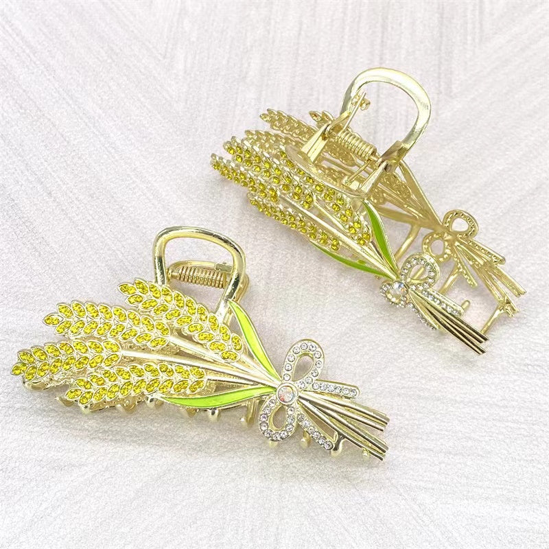 Ears of wheat claw within yellow