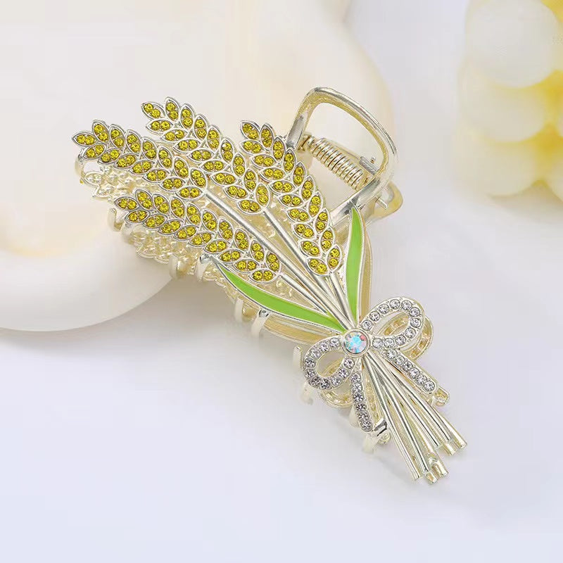 Ears of wheat claw within yellow