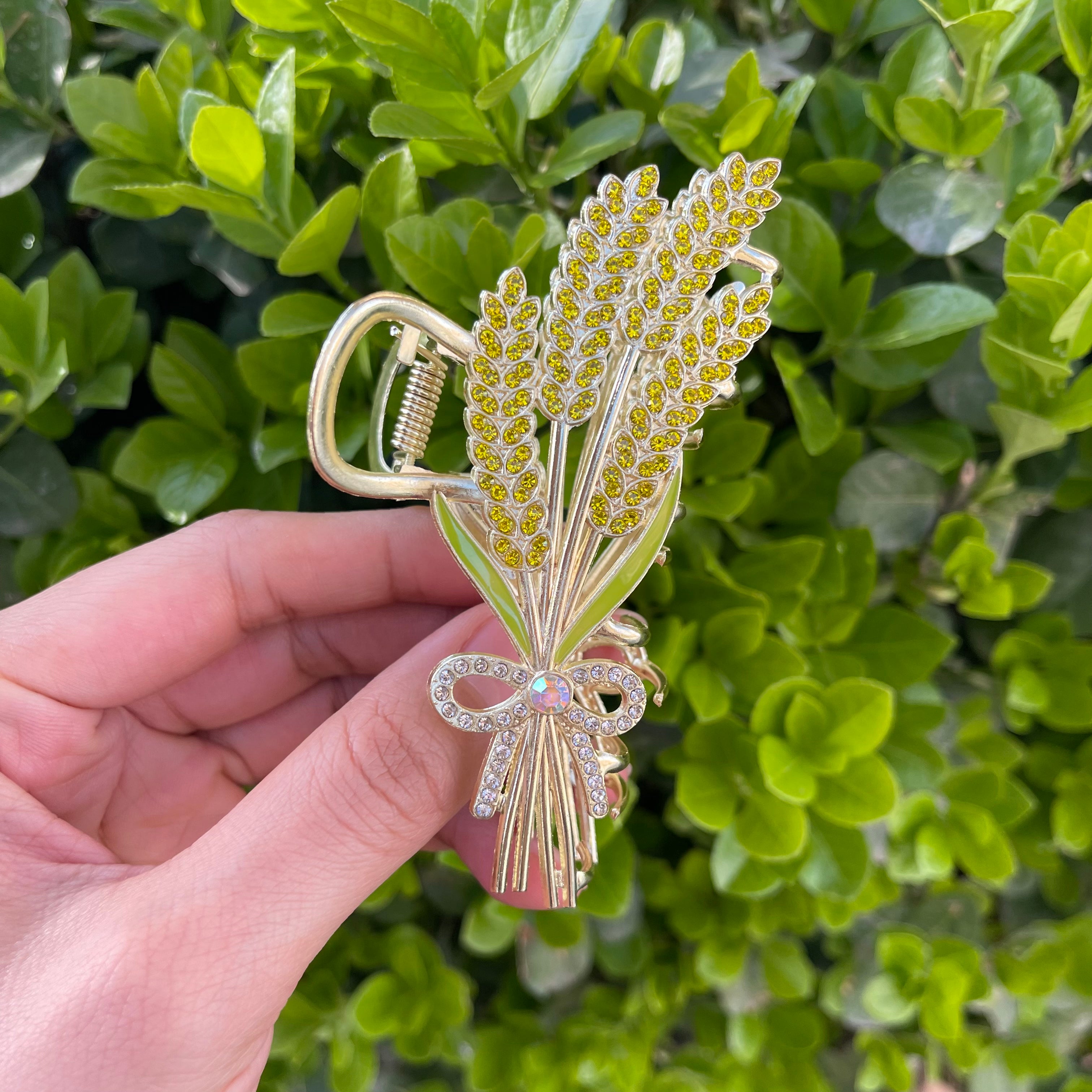 Ears of wheat claw within yellow