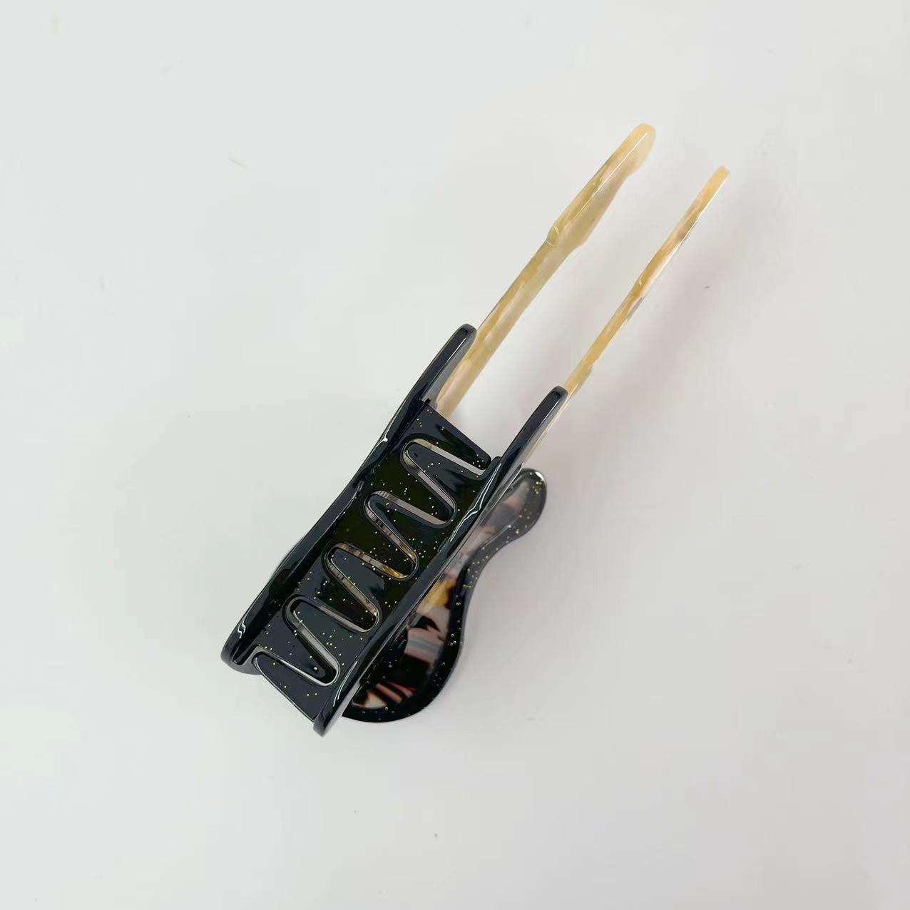 Comely black guitar hair claw