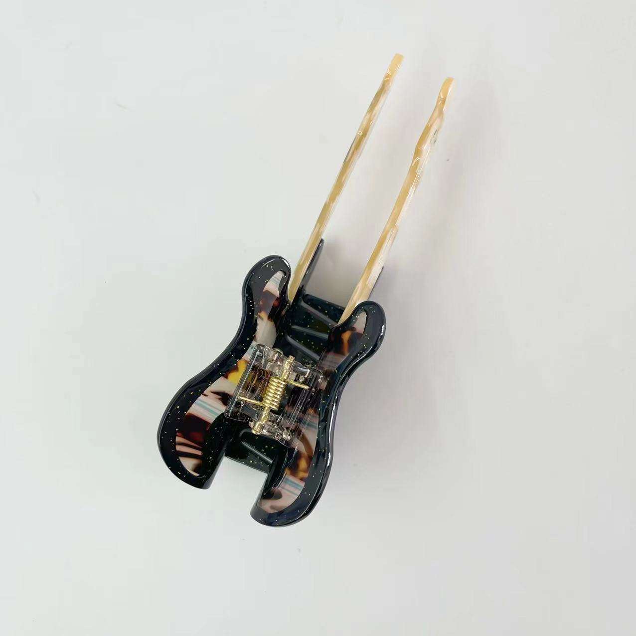 Comely black guitar hair claw