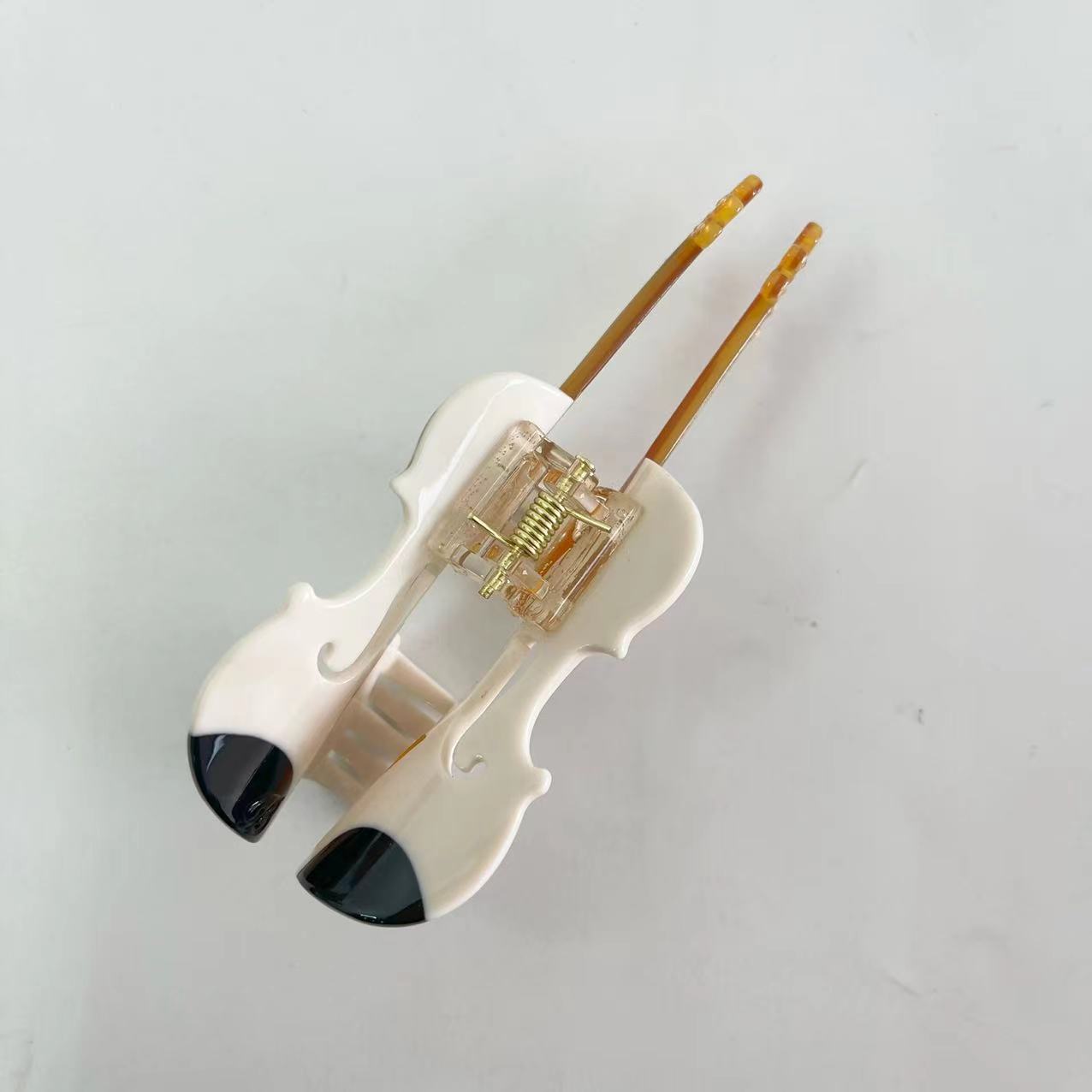White violin hair claw