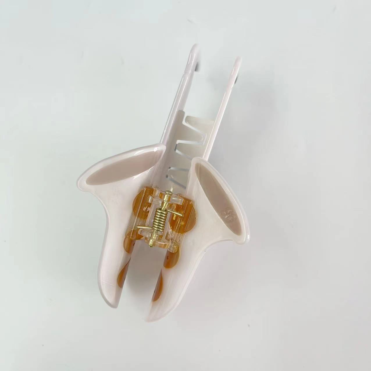 White saxophone hair claw