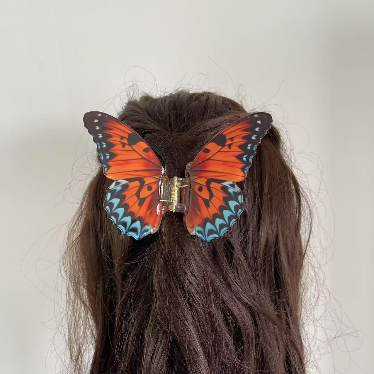 Vanessa butterfly hair claw in Orange