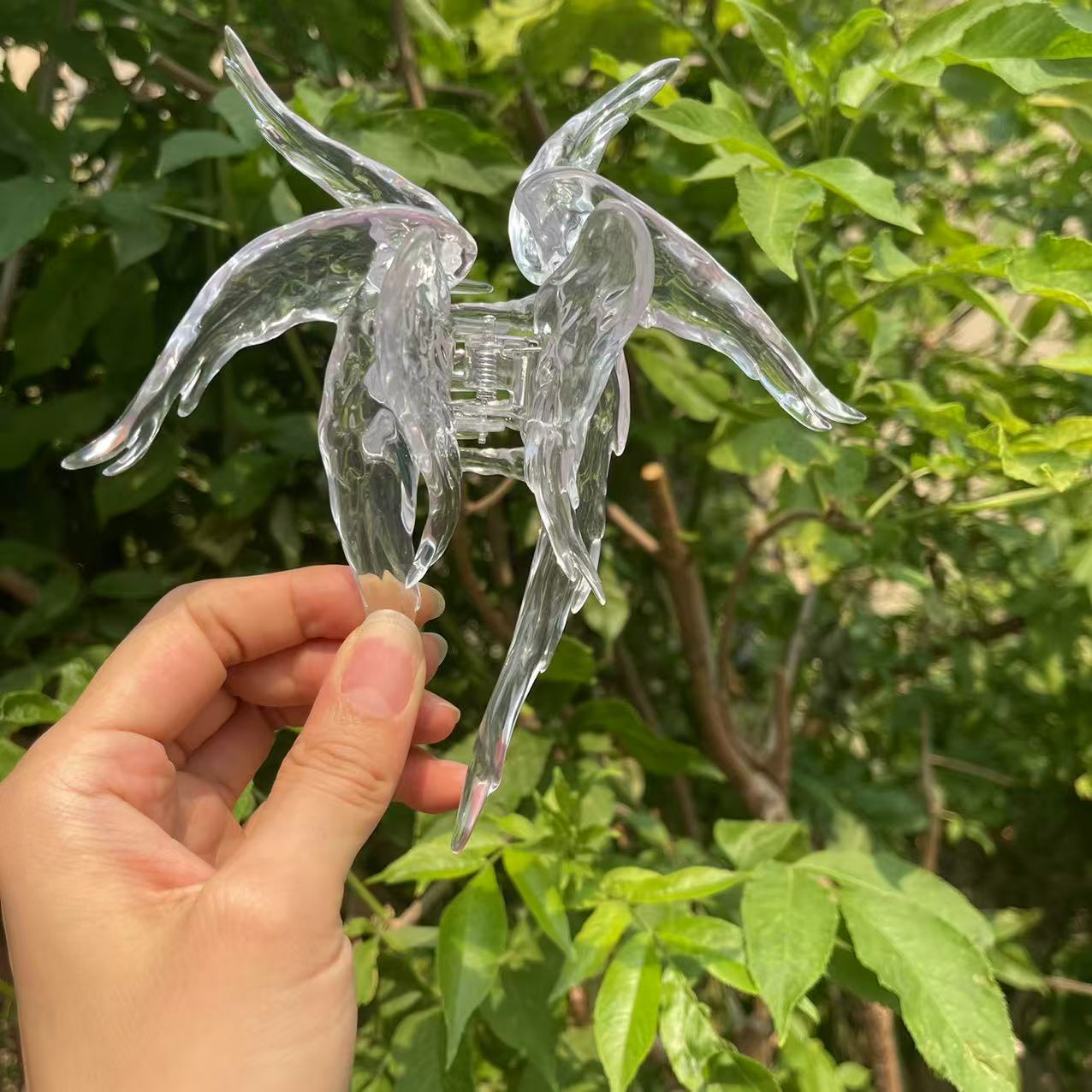 Angel wings hair claw within crystal