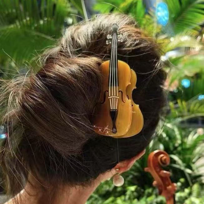 Diamond violin hair claw within brown