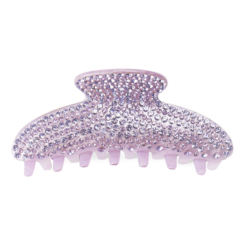 Handmade rhinestone claw within Blue