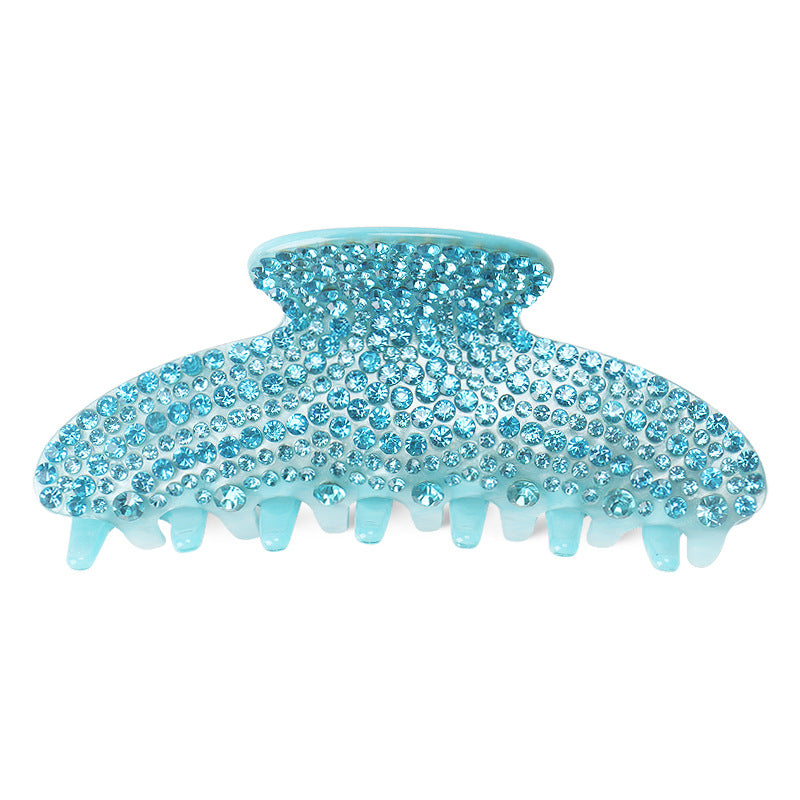 Handmade rhinestone claw within Blue