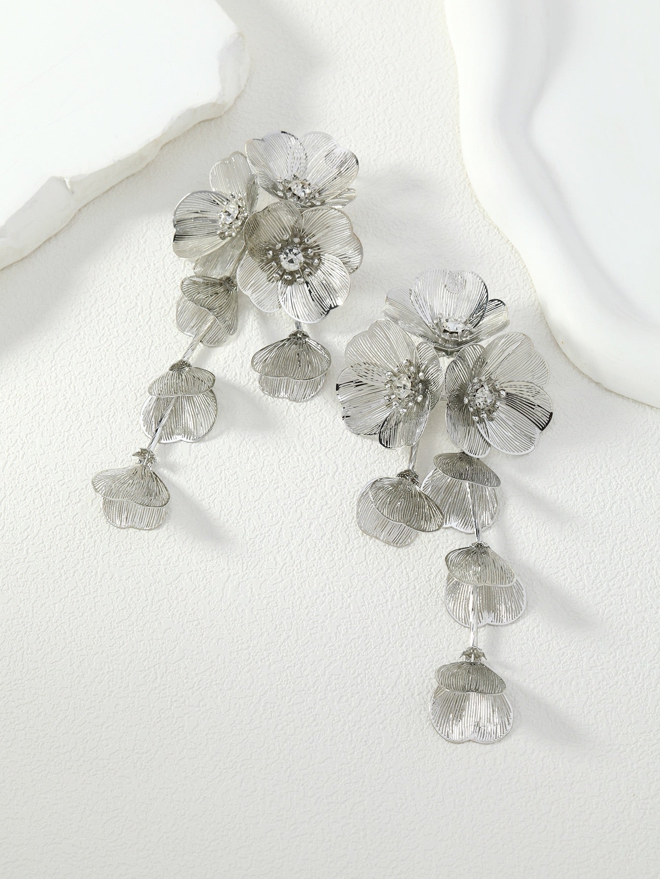 Silver woven flower earrings