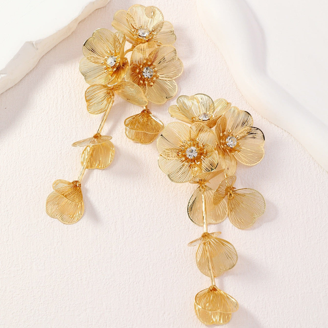 Golden woven flower earrings