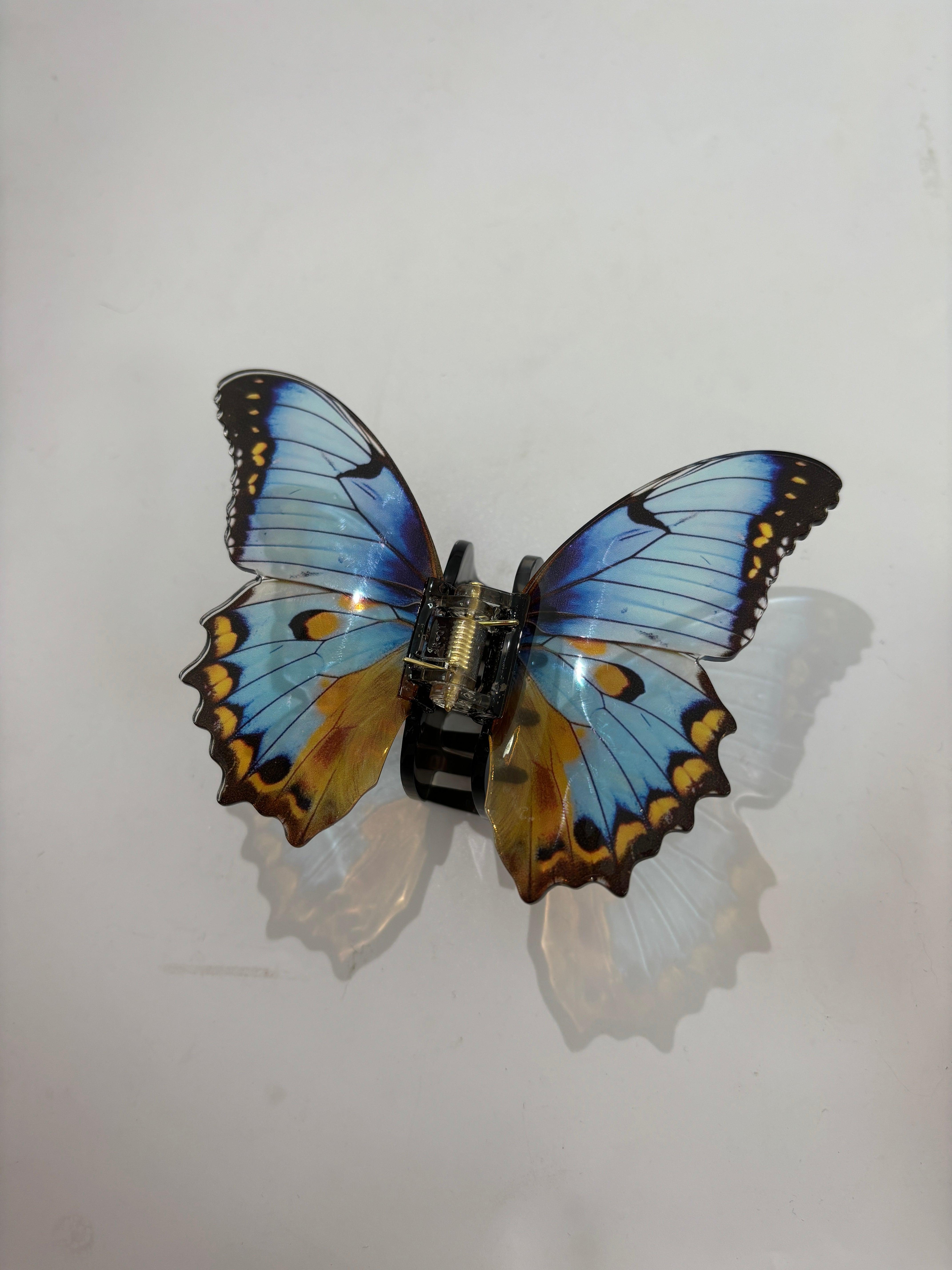 Crystal colored butterfly claw