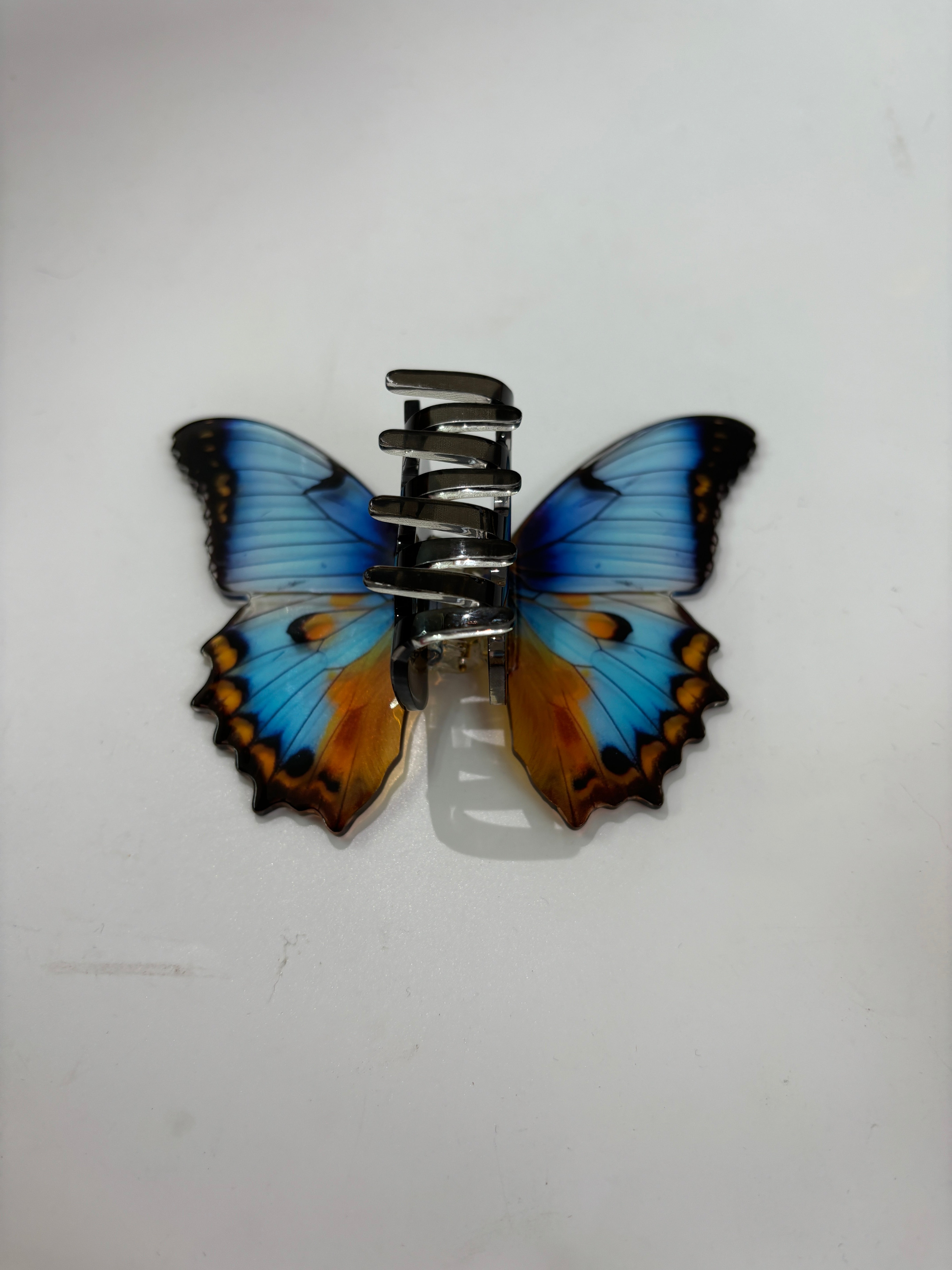 Crystal colored butterfly claw