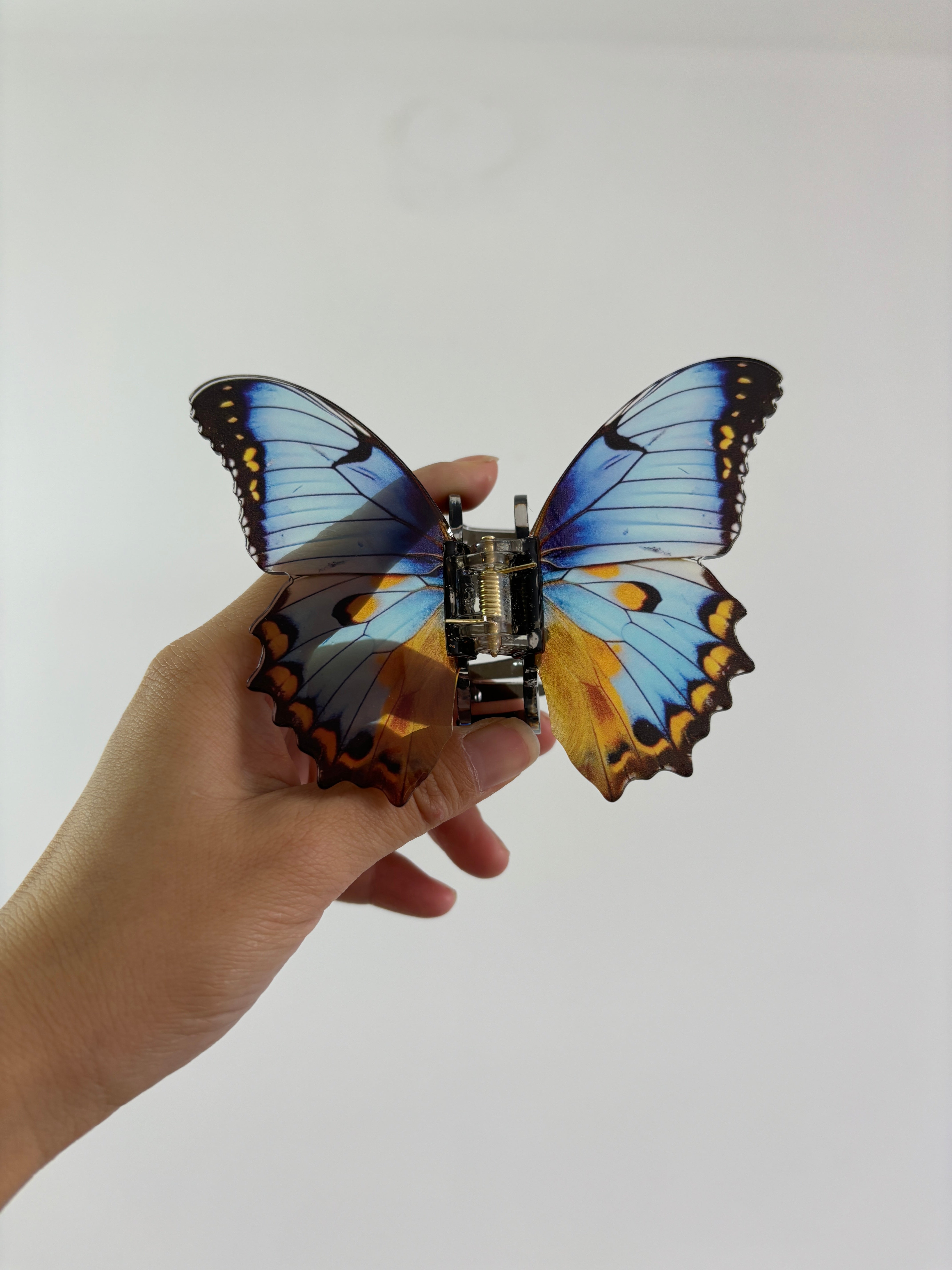 Crystal colored butterfly claw