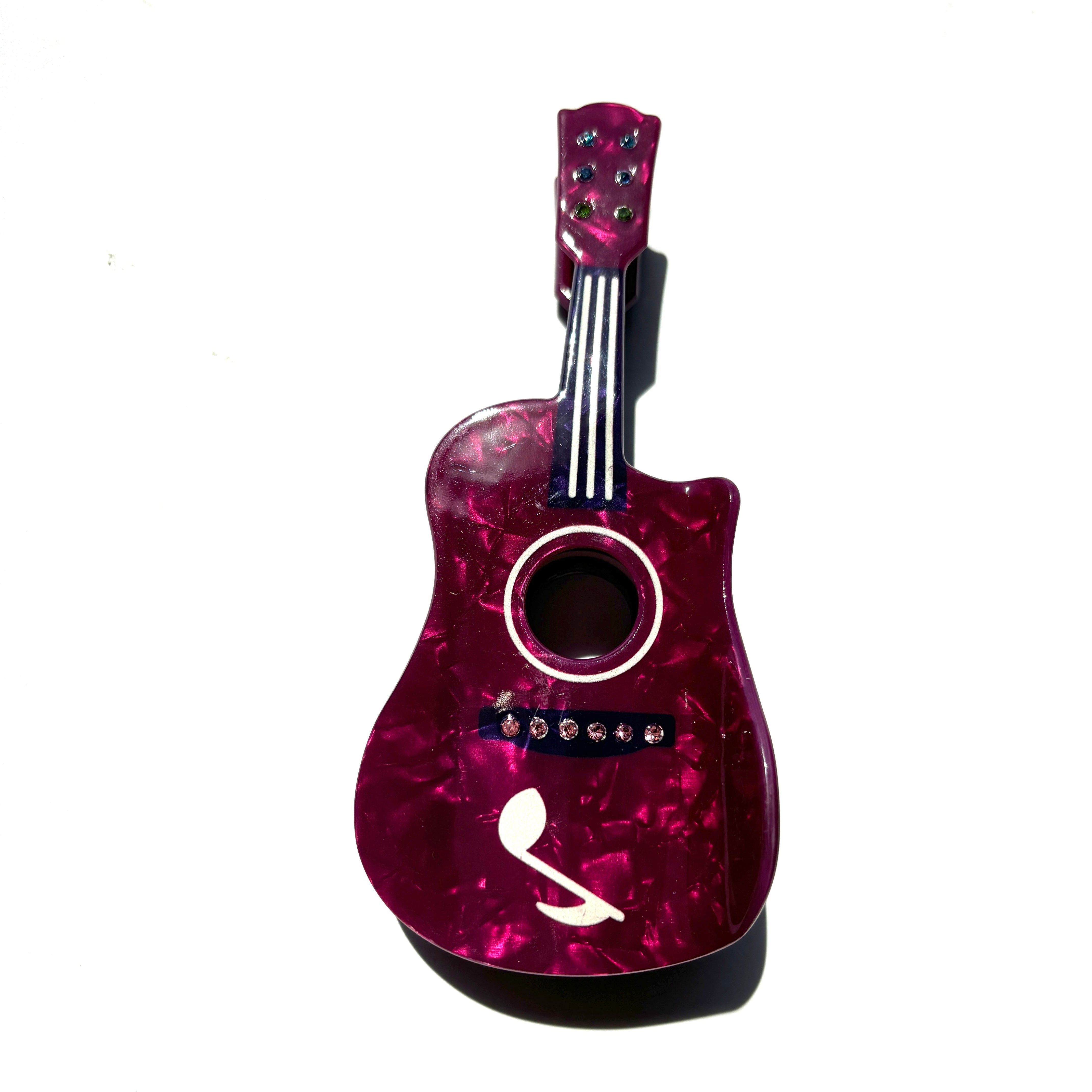 date cake guitar hair claw