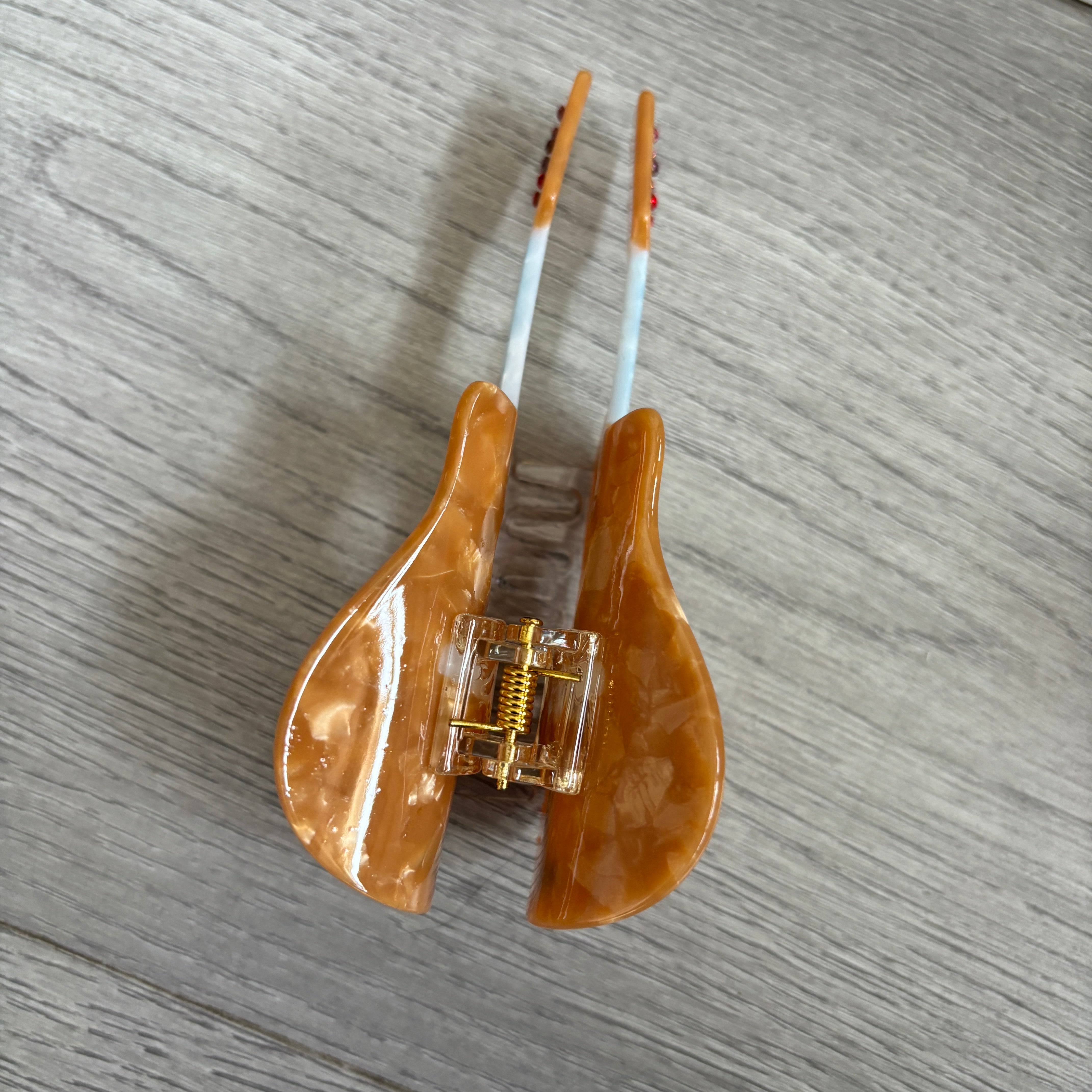 Orange guitar hair claw