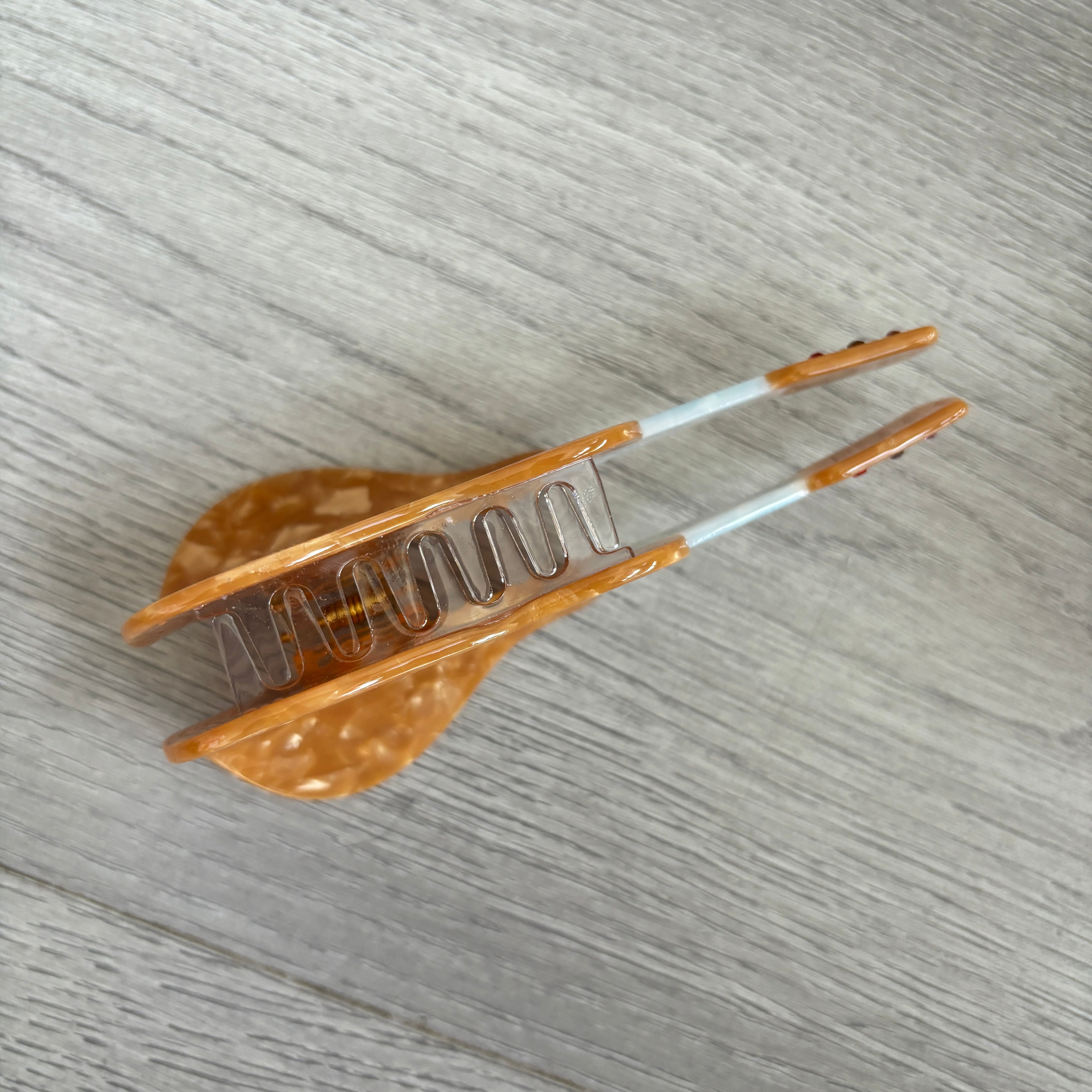 Orange guitar hair claw