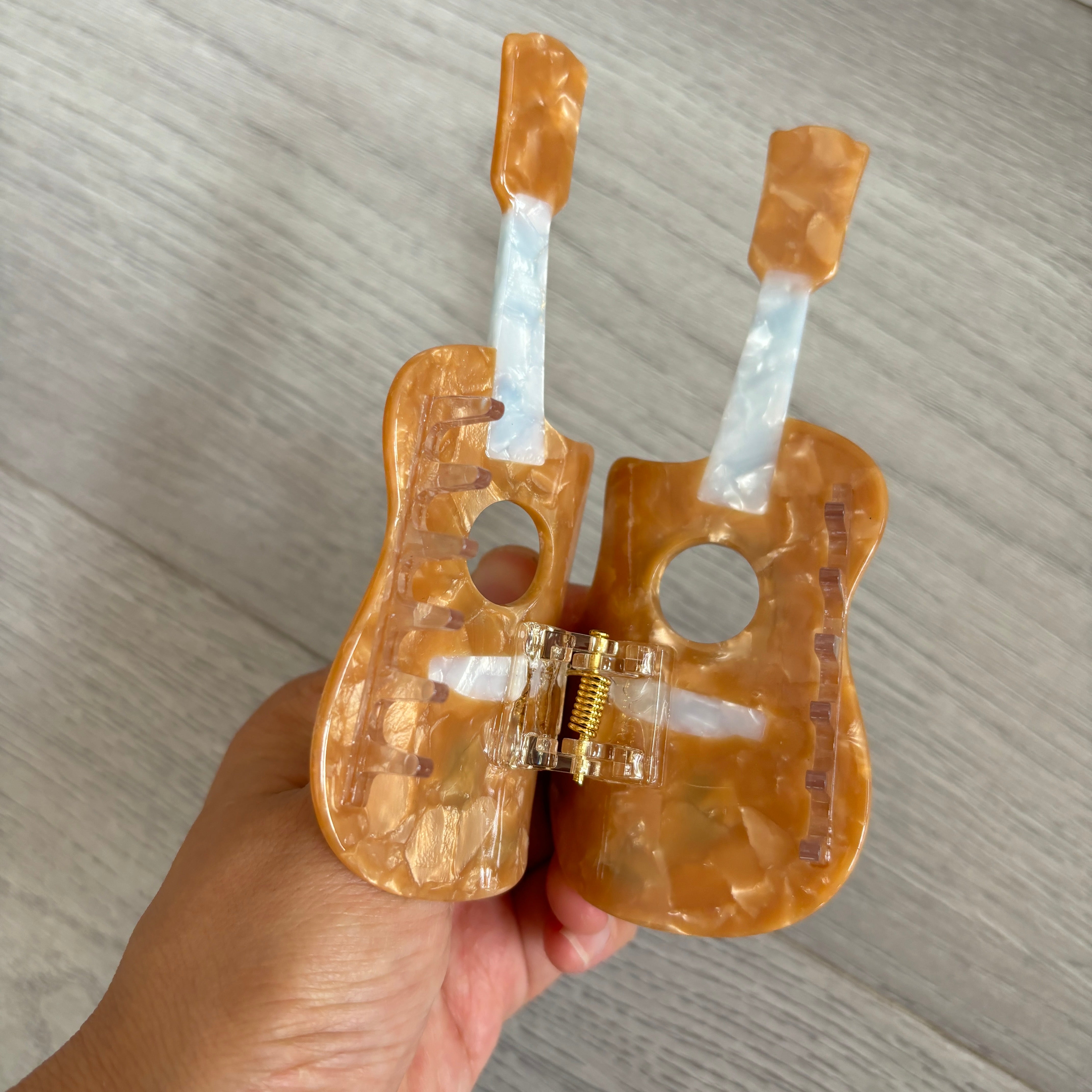Orange guitar hair claw
