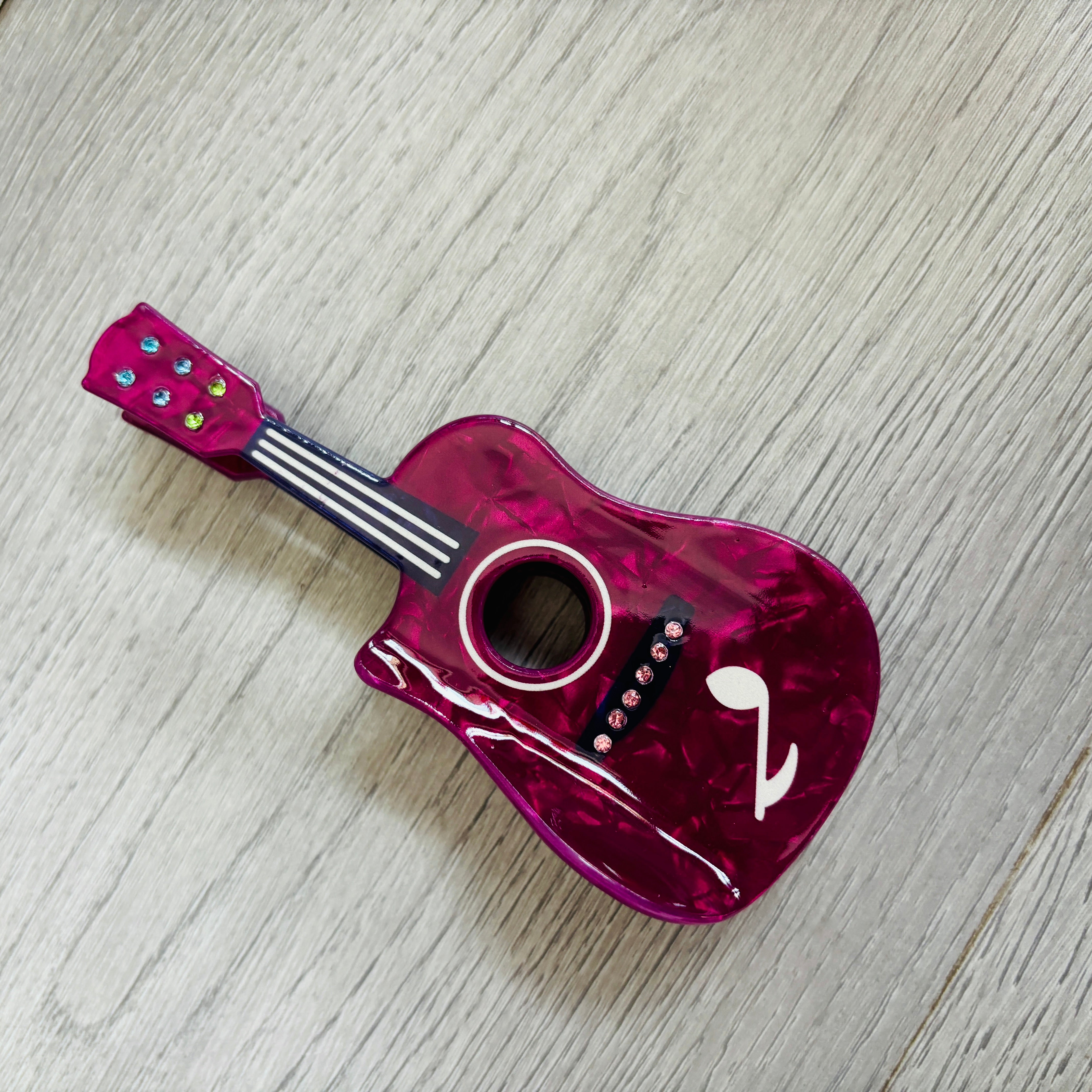 date cake guitar hair claw