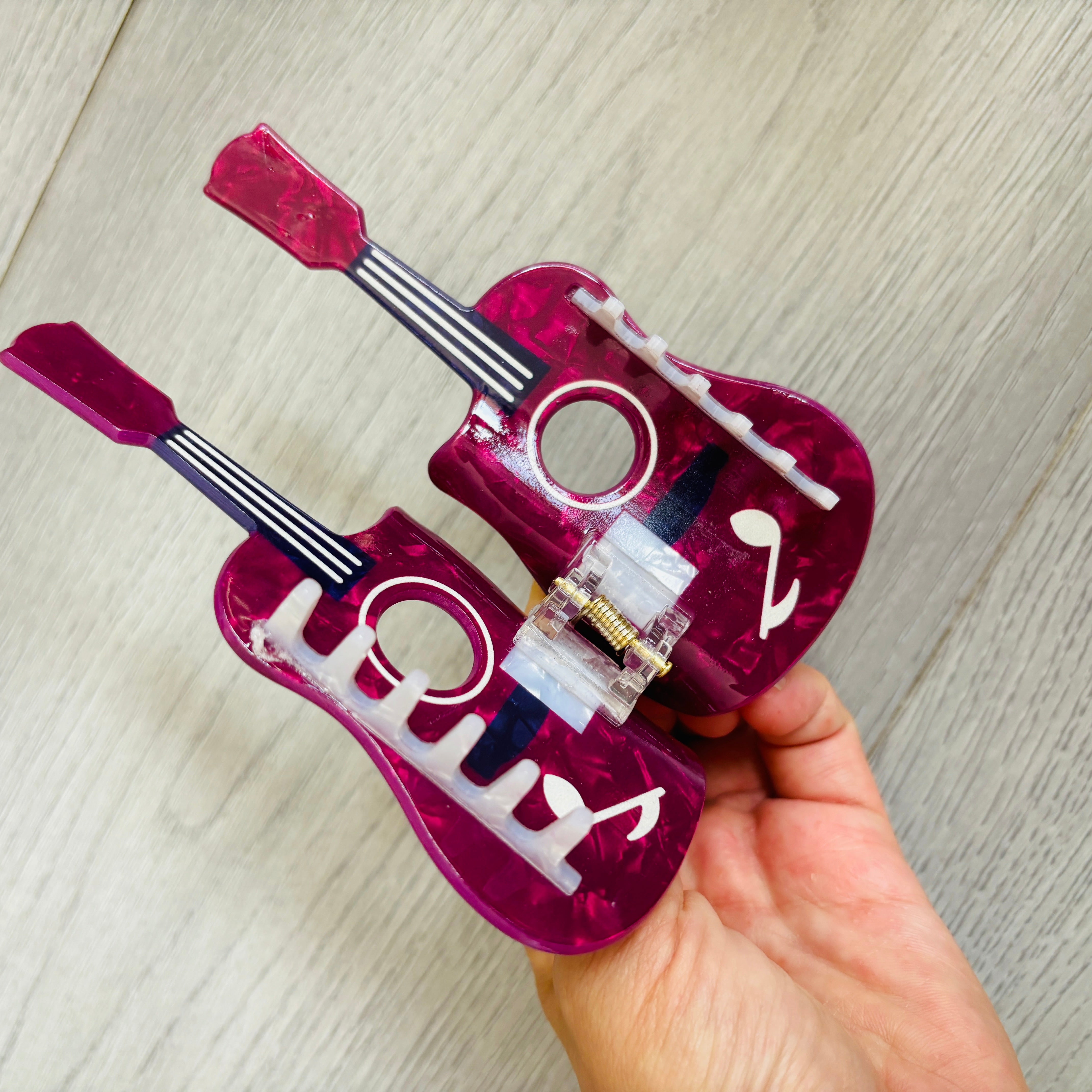 date cake guitar hair claw