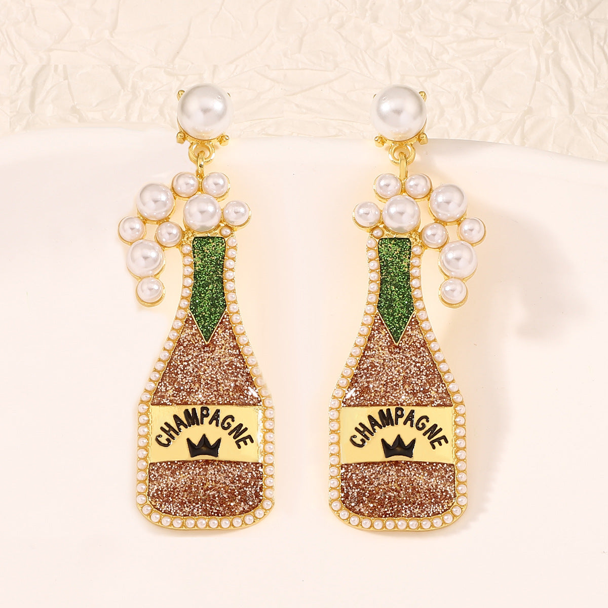 Cute beer bottle earrings within gloden