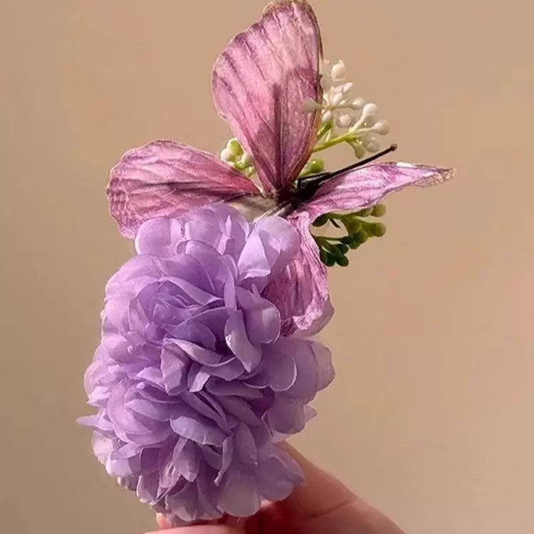 Butterfly around purple flowers hair claw