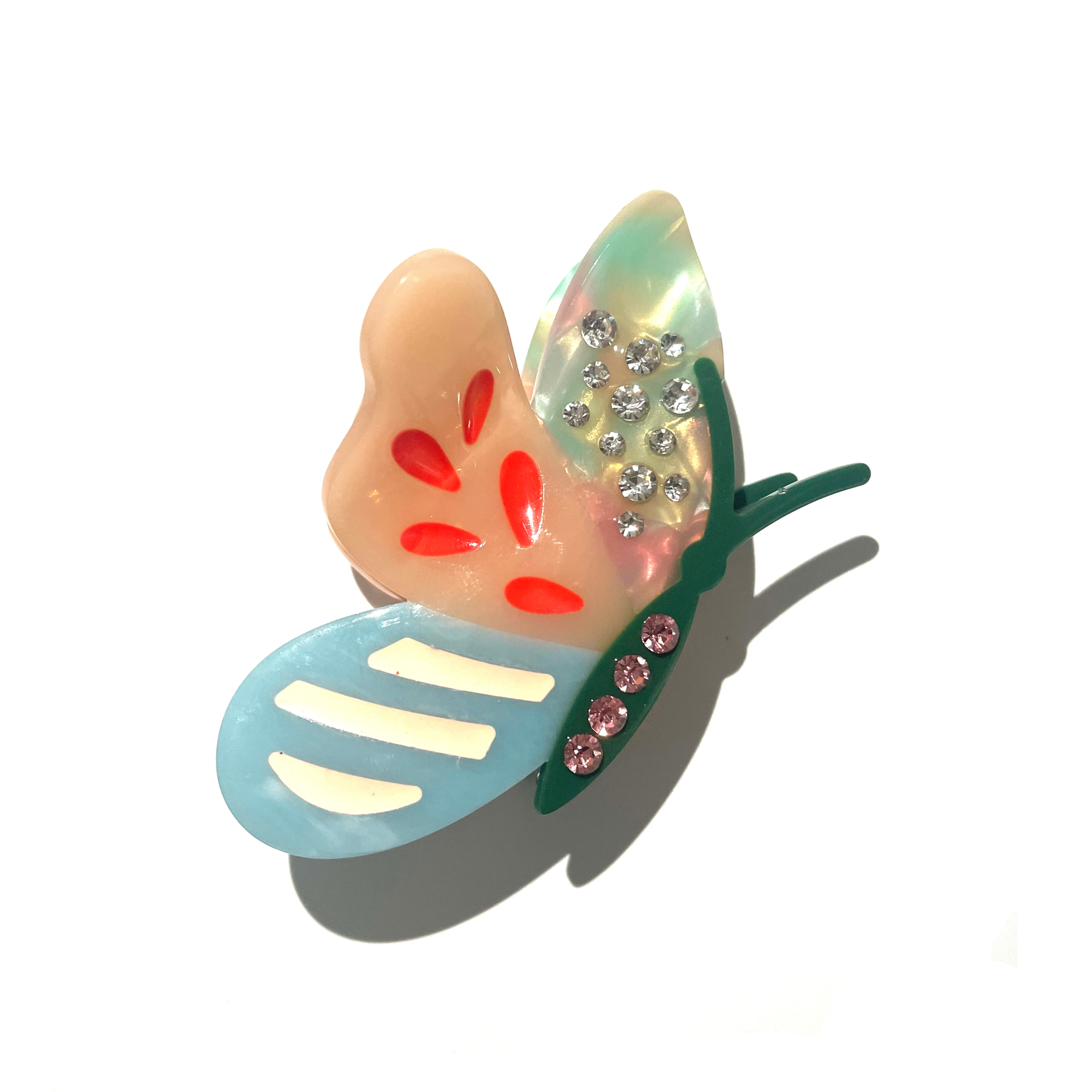 Sugar Butterfly claw within diamond