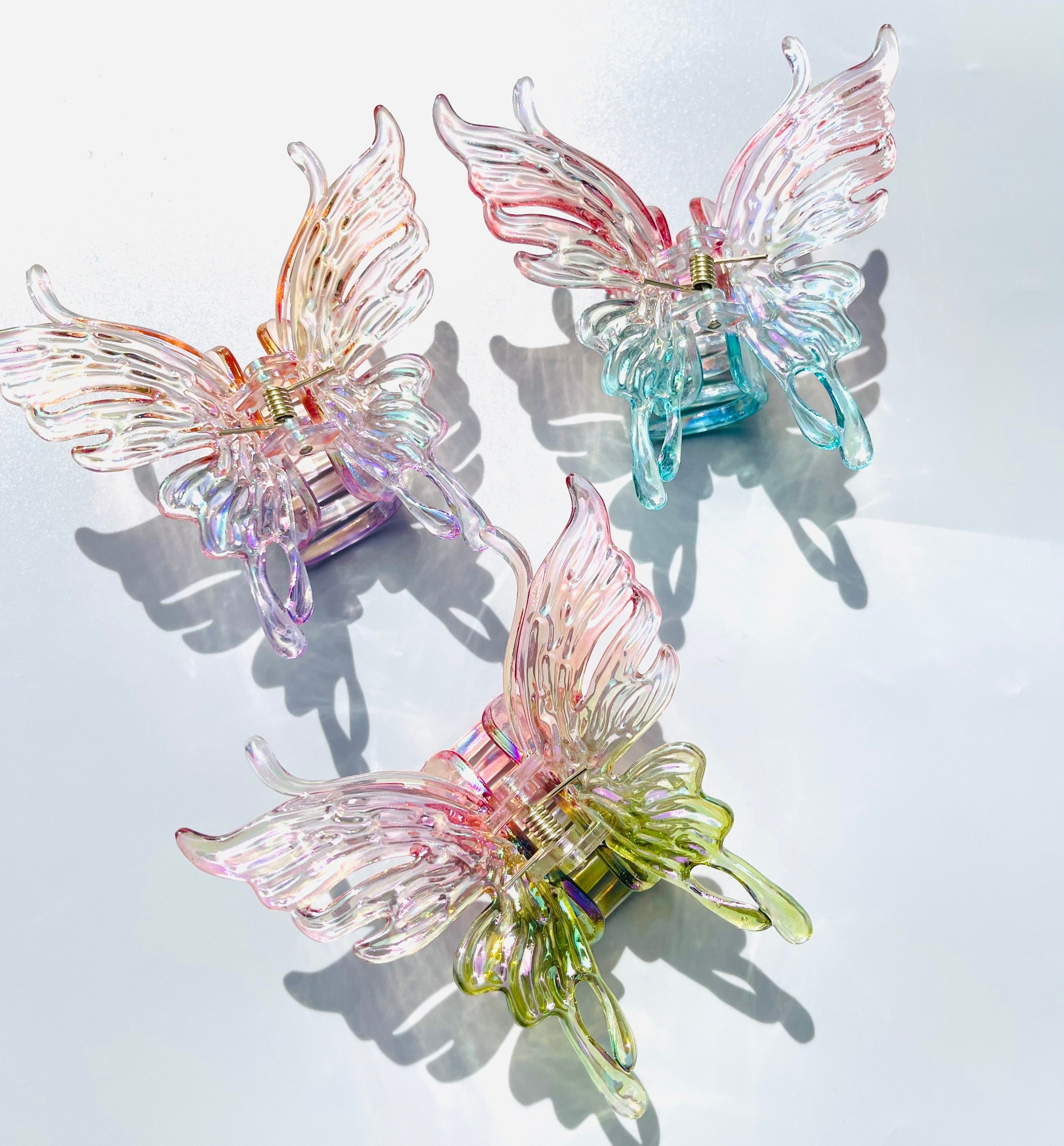 Gradient butterfly claw within purple