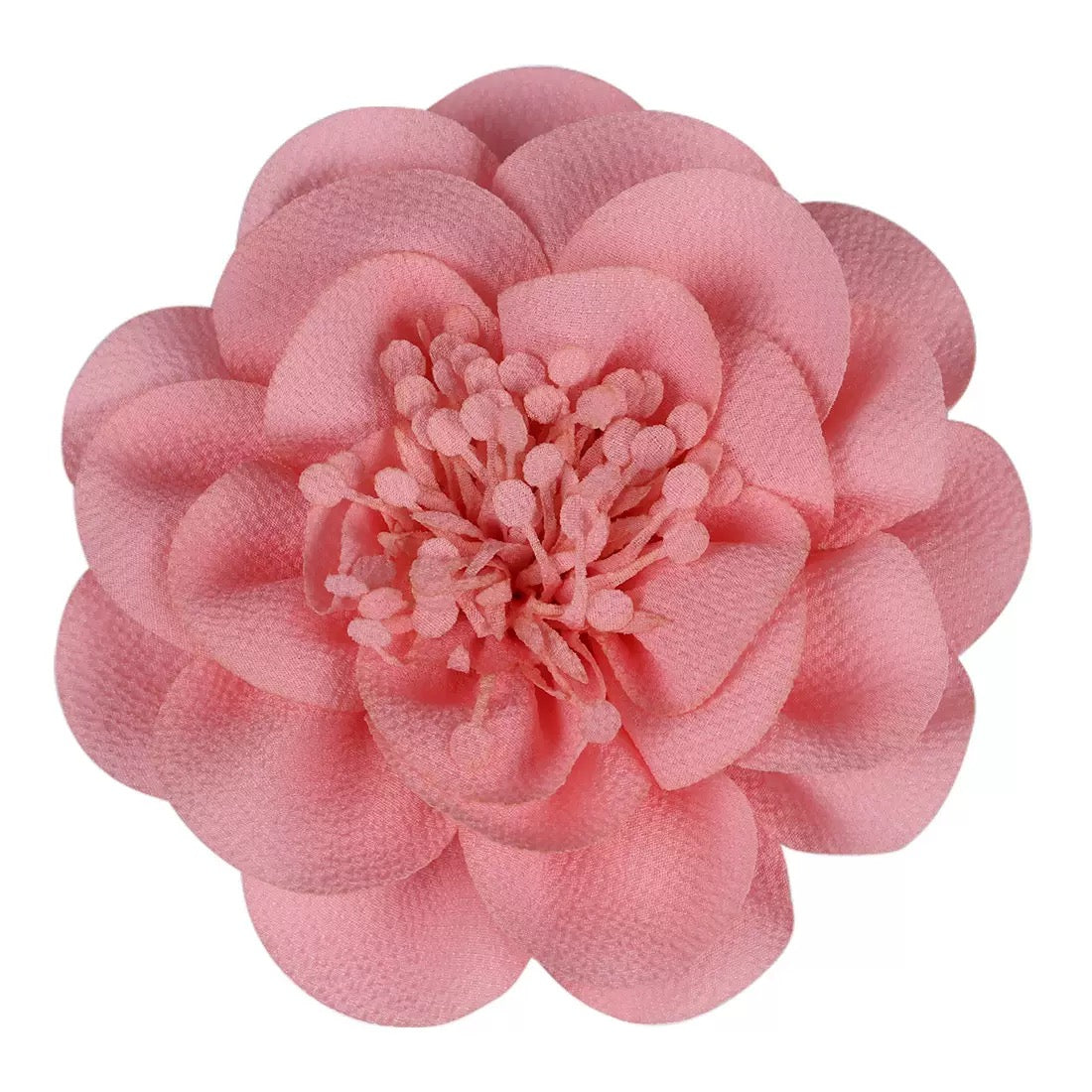 Handmade fabric flower clip within pink