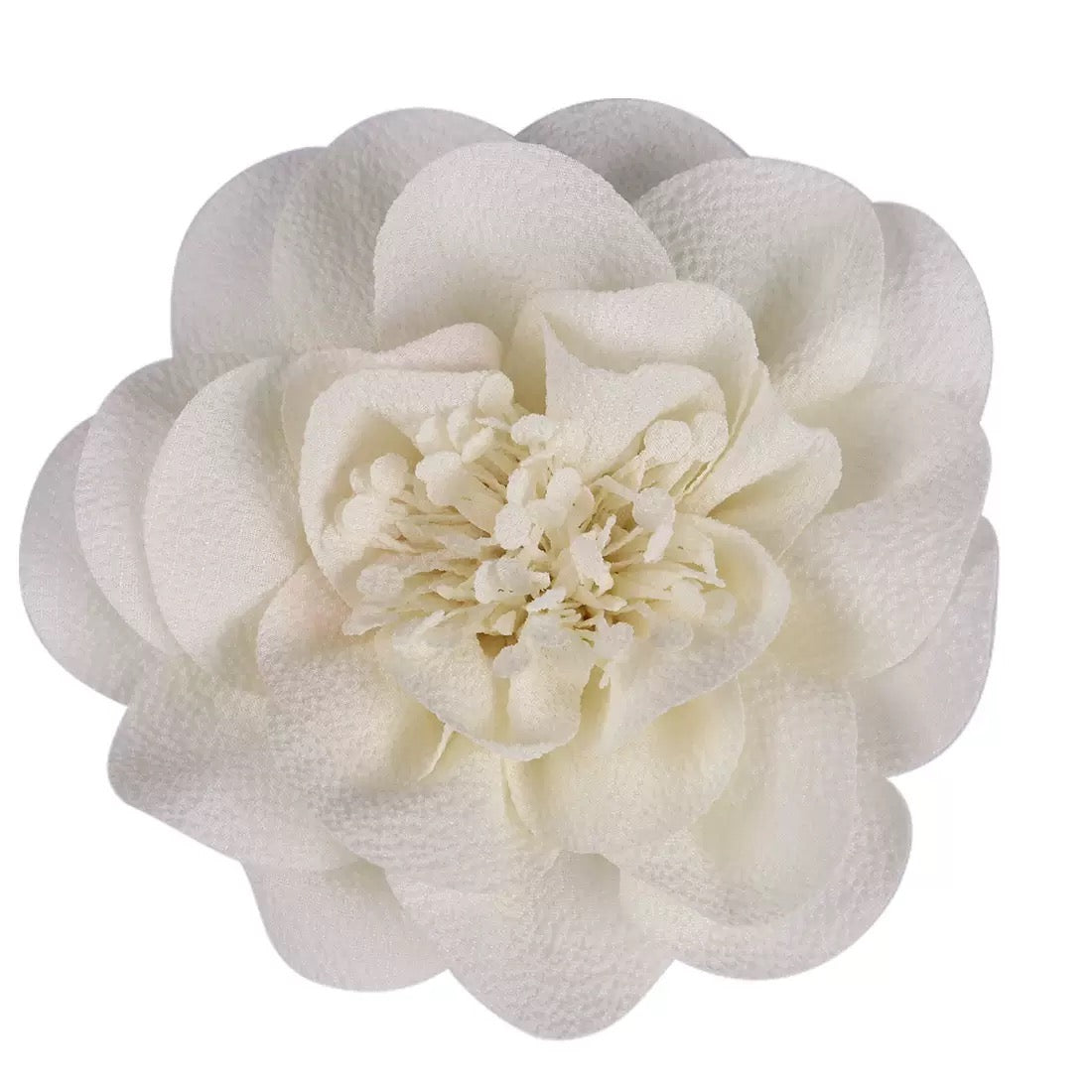 Handmade fabric flower clip within white