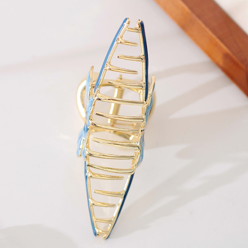 Gradient butterfly claw within blue