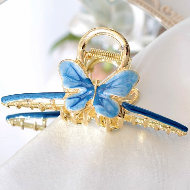 Gradient butterfly claw within blue