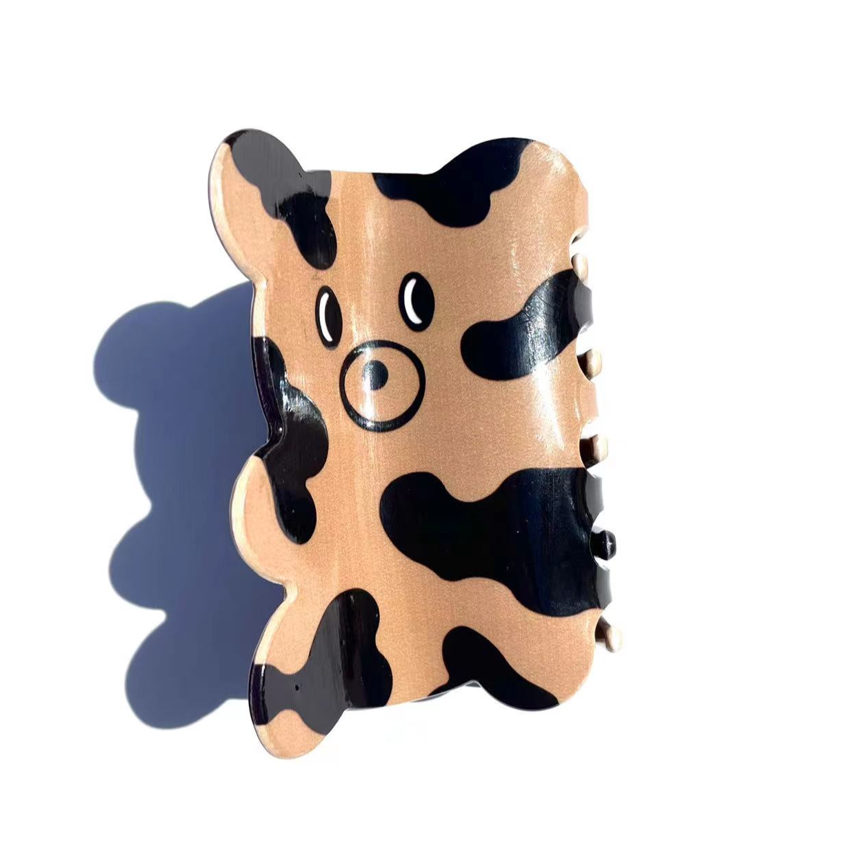 CURIOUS COW claw within pink