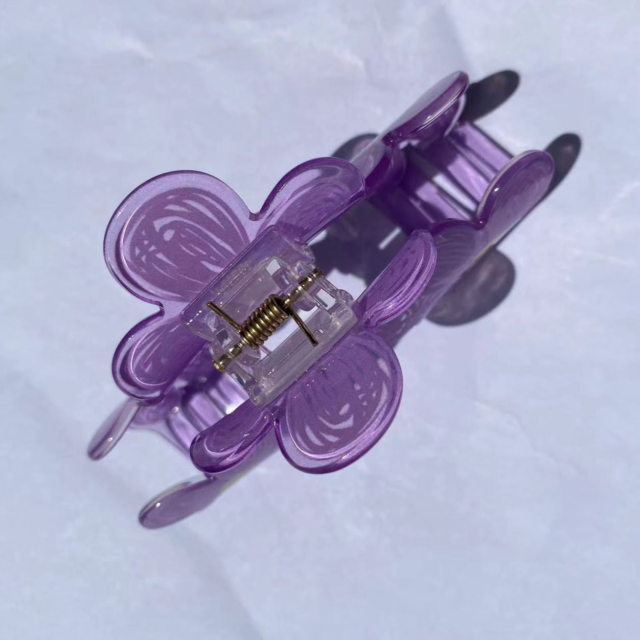 daisy Claw within purple